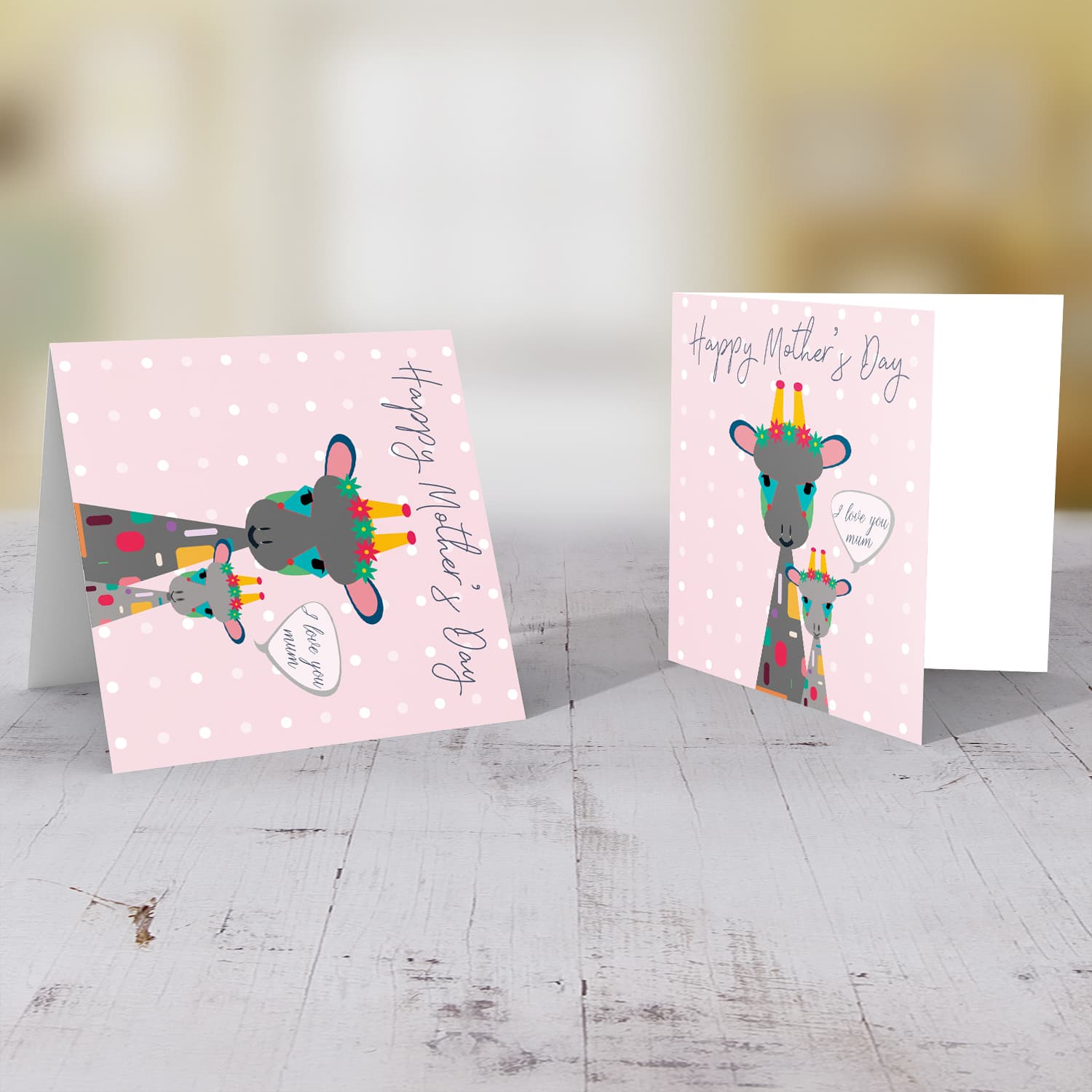 Giraffe themed mothers day card with pastel pink background in English