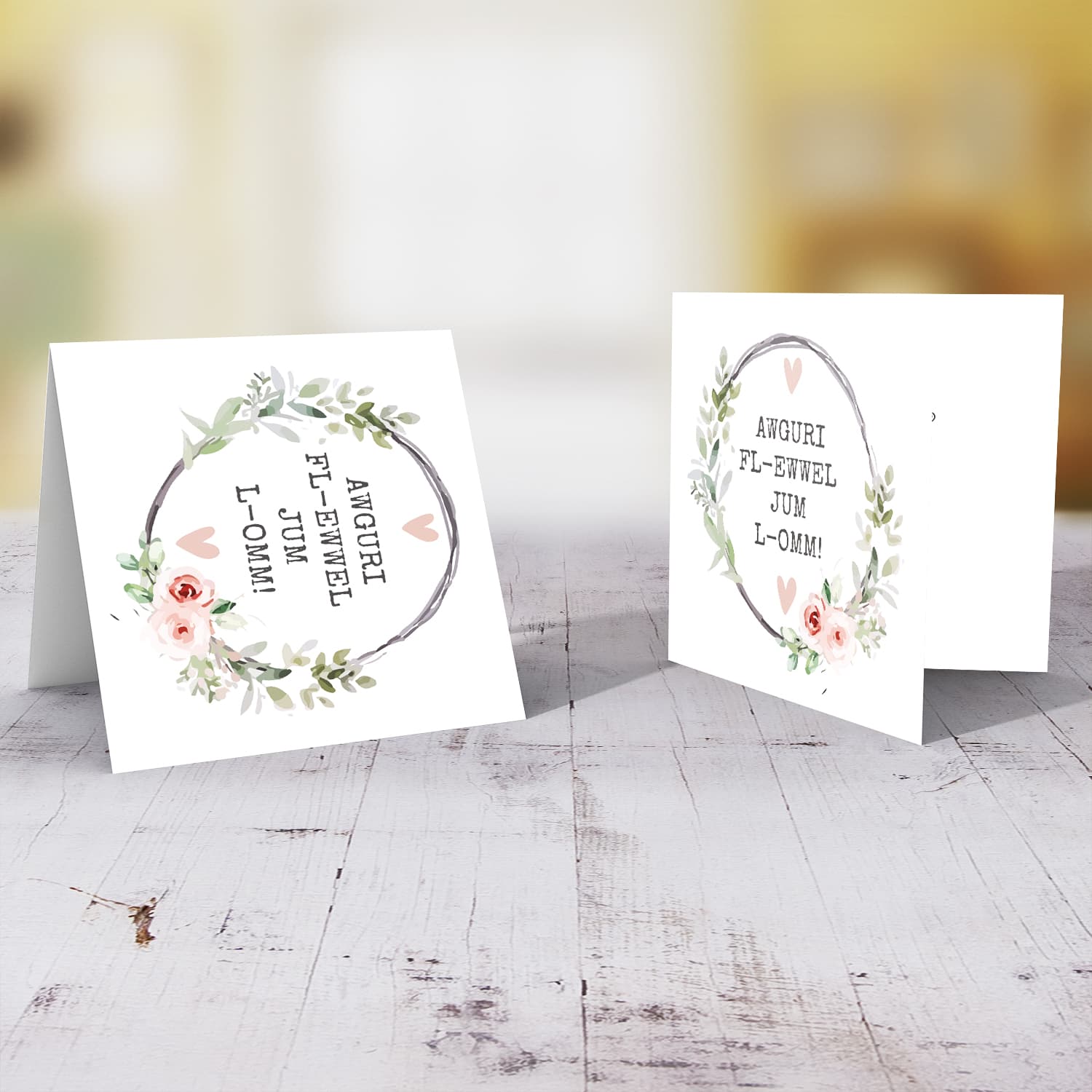 First Mother's day greeting card in Maltese with wreath and pink hearts 