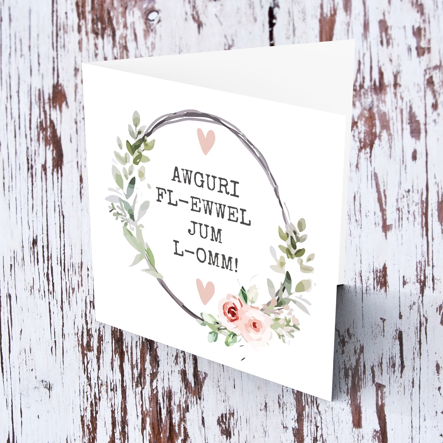 First Mother's day greeting card in Maltese with wreath and pink hearts 