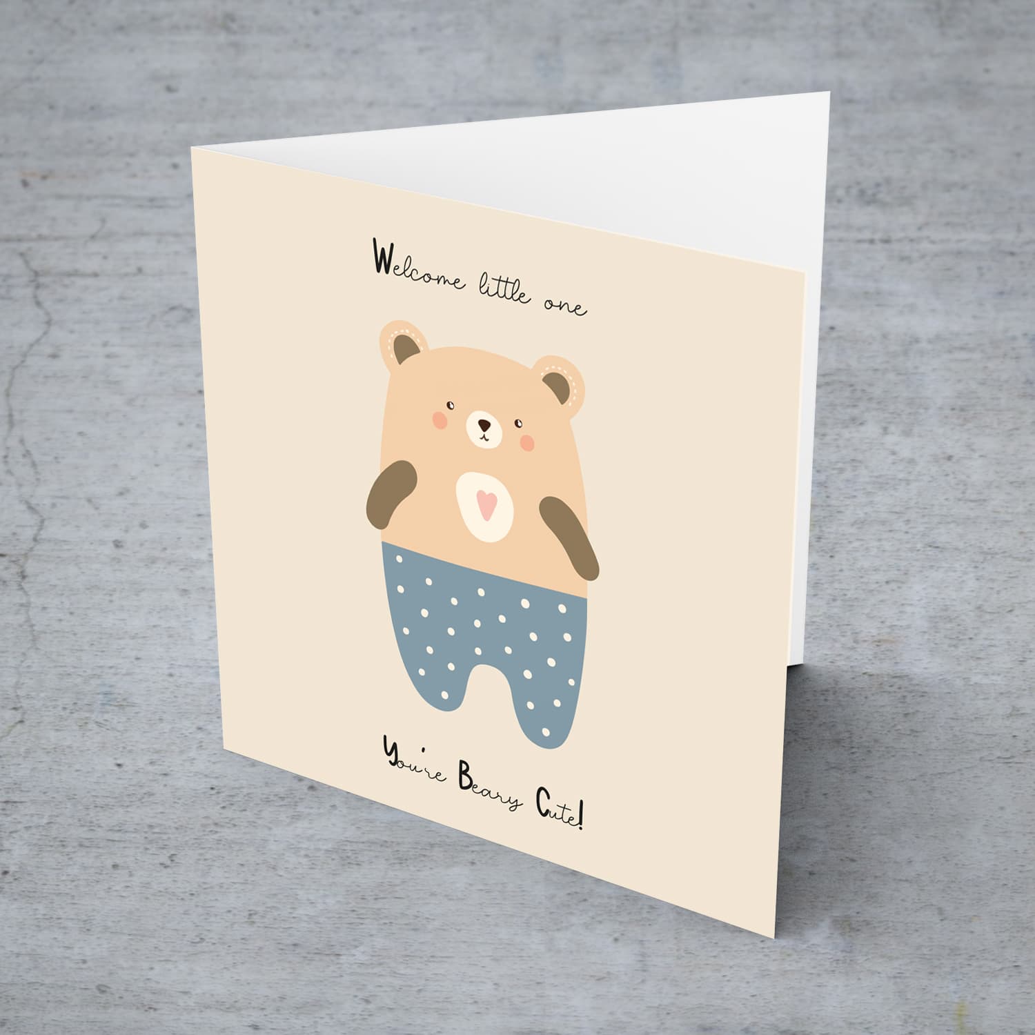 Beary Cute teddy bear, wearing blue pants with white dots New Born card for Boys in English