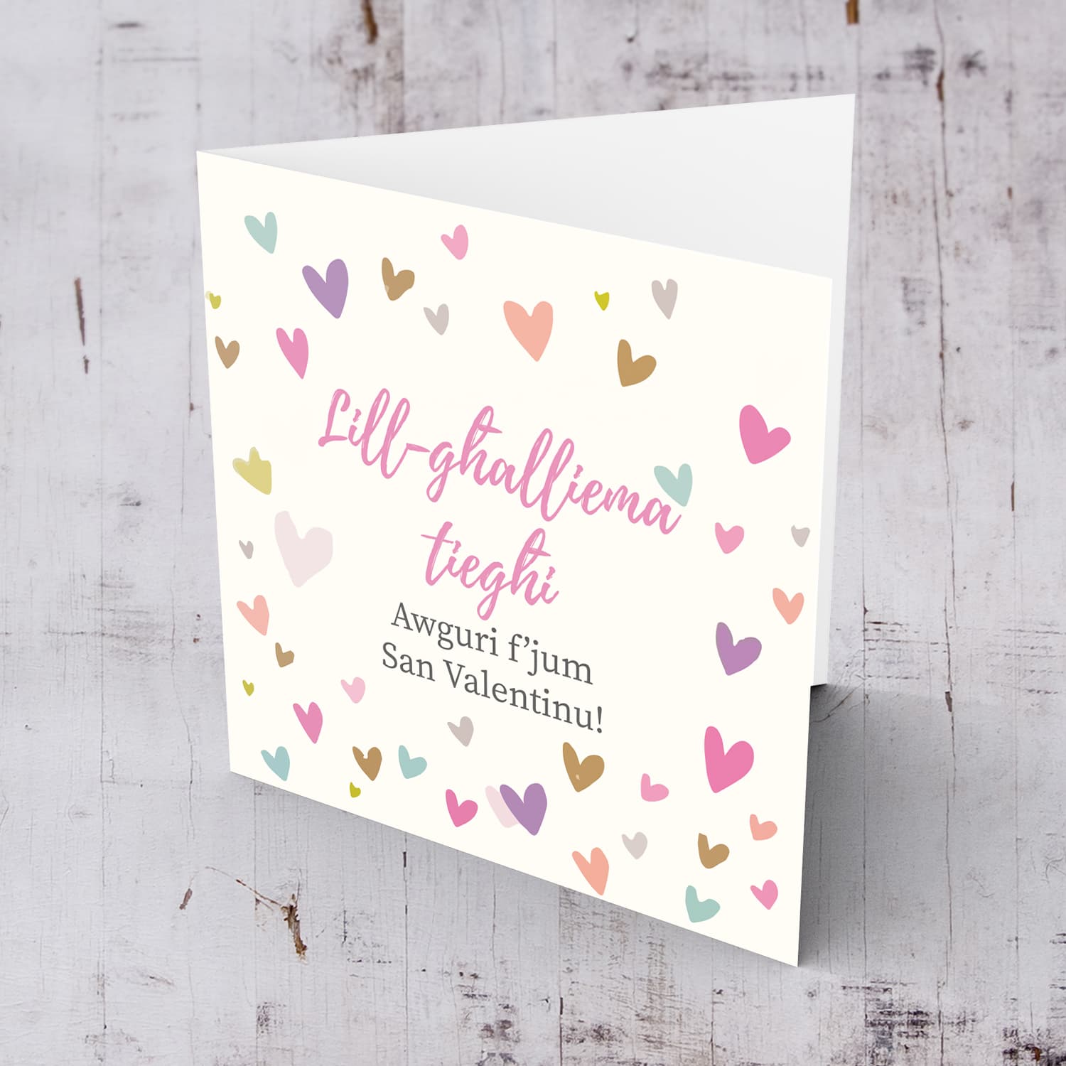 Colourful heart background Valentines card for teacher in Maltese