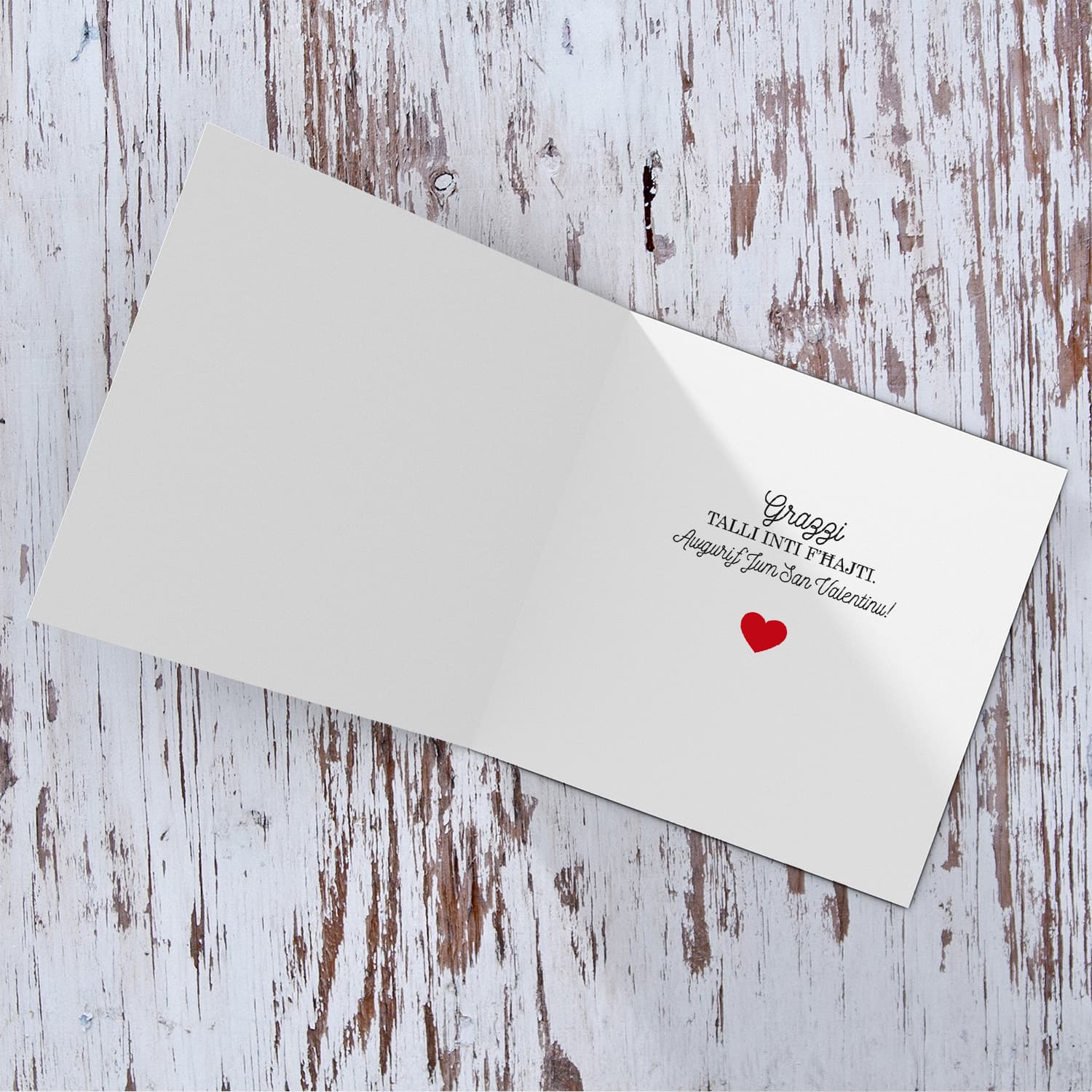 Dog themed Valentine's card with scattered red hearts in Maltese