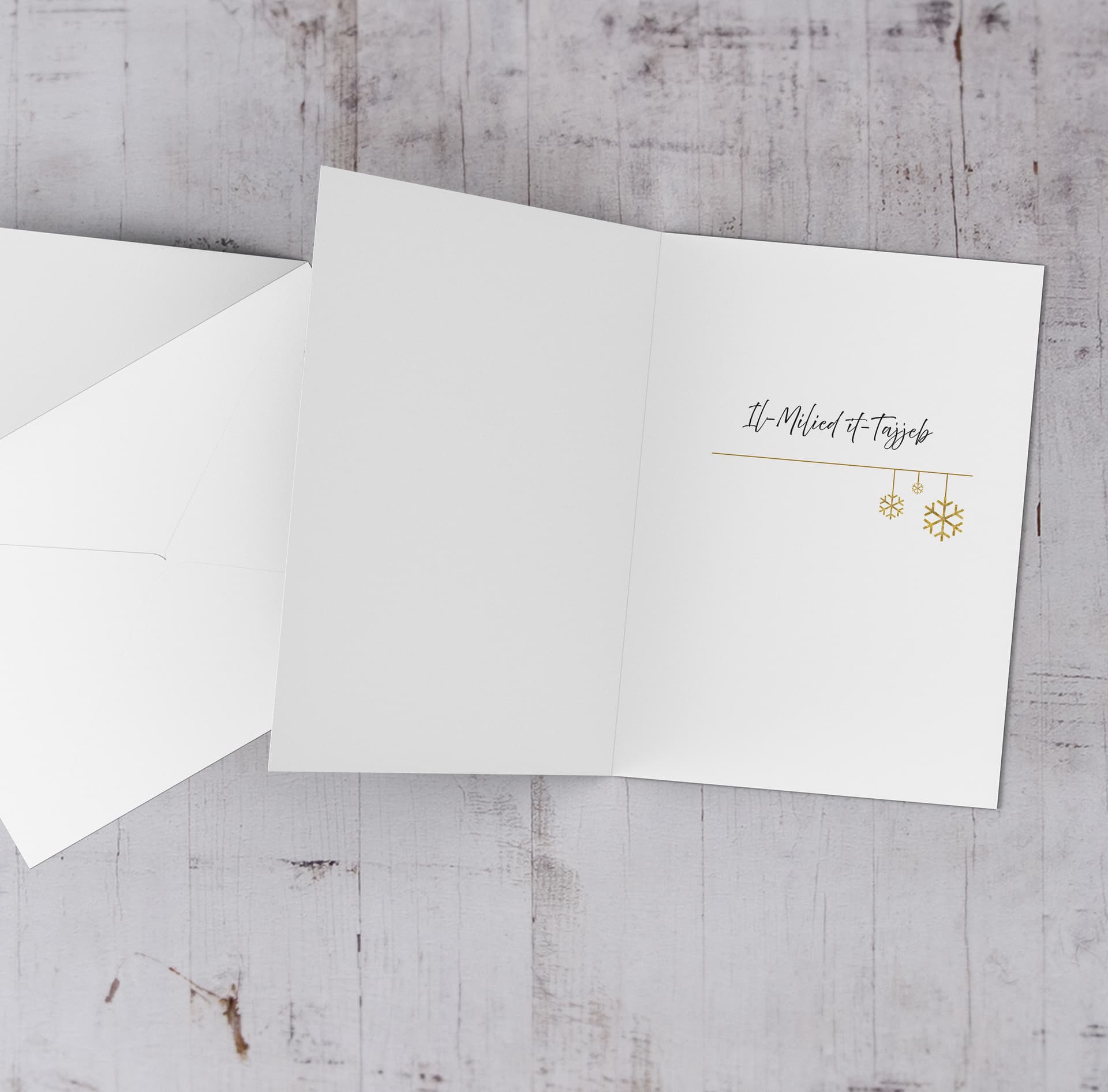 An a5 Christmas greeting card, featuring the Nativity scene in in watercolours, with minimalist details in Maltese