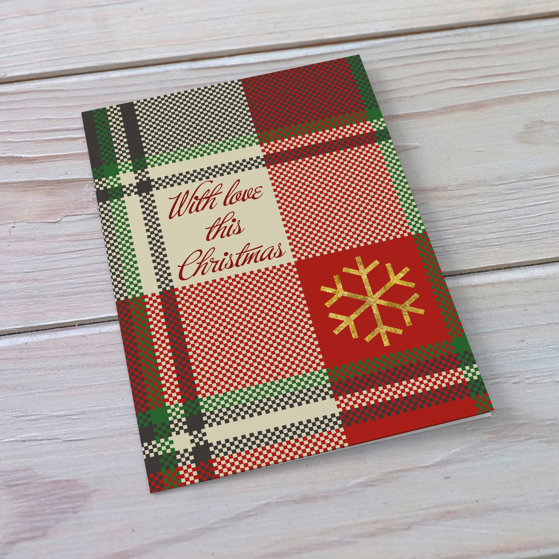 A beautiful A5 Christmas card in a tartan print, featuring a golden snowflake in English 
