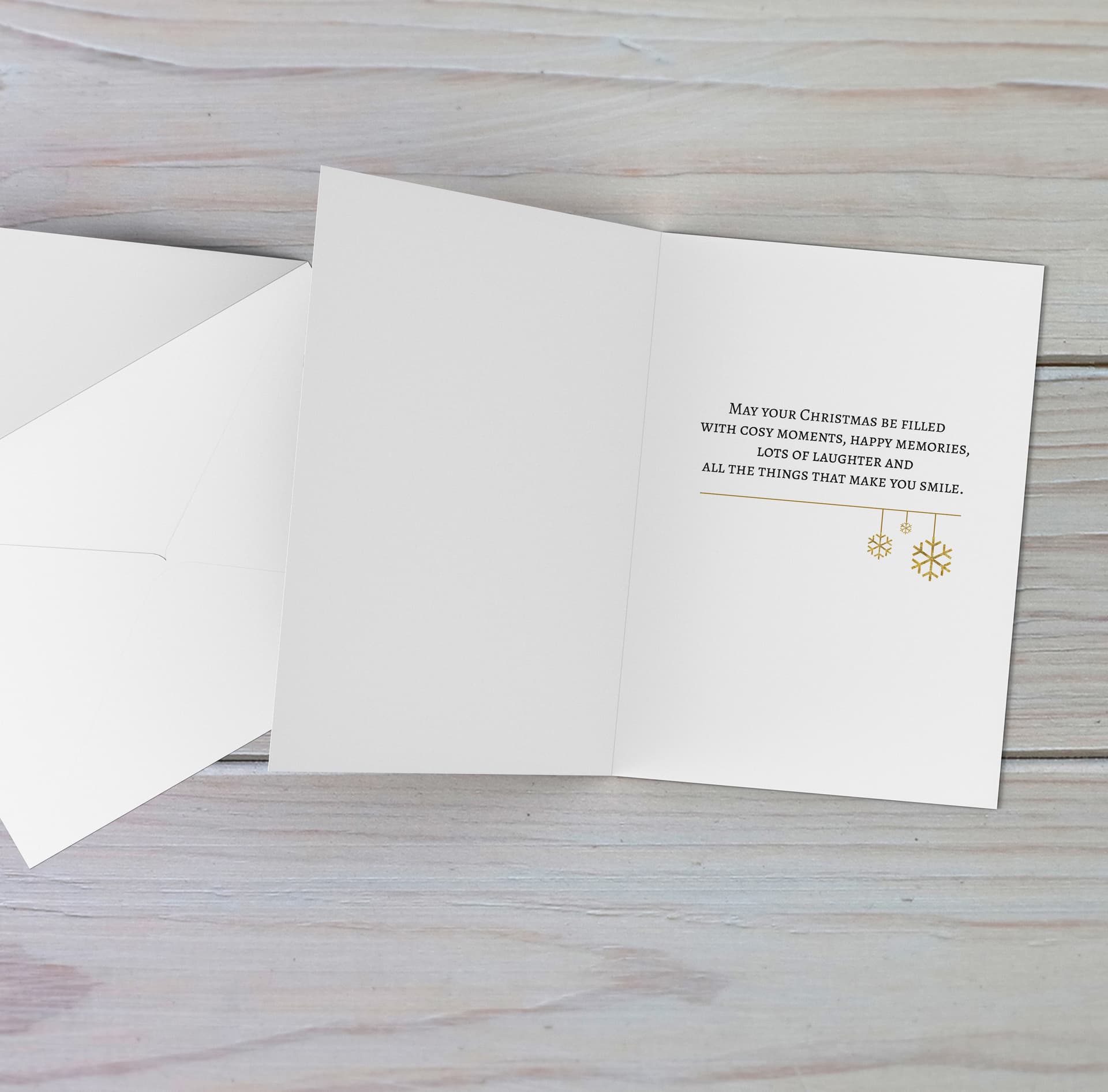 A beautiful A5 Christmas card in a tartan print, featuring a golden snowflake in English 