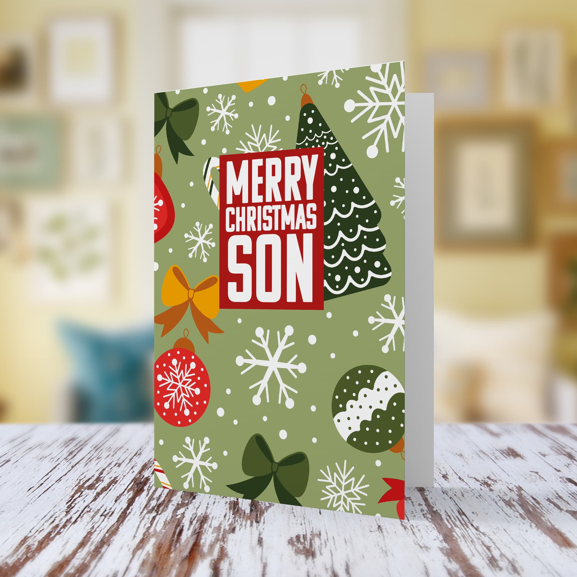 An a5 Christmas card for SON, featuring a Christmassy background including baubles, bows and snowflakes in English