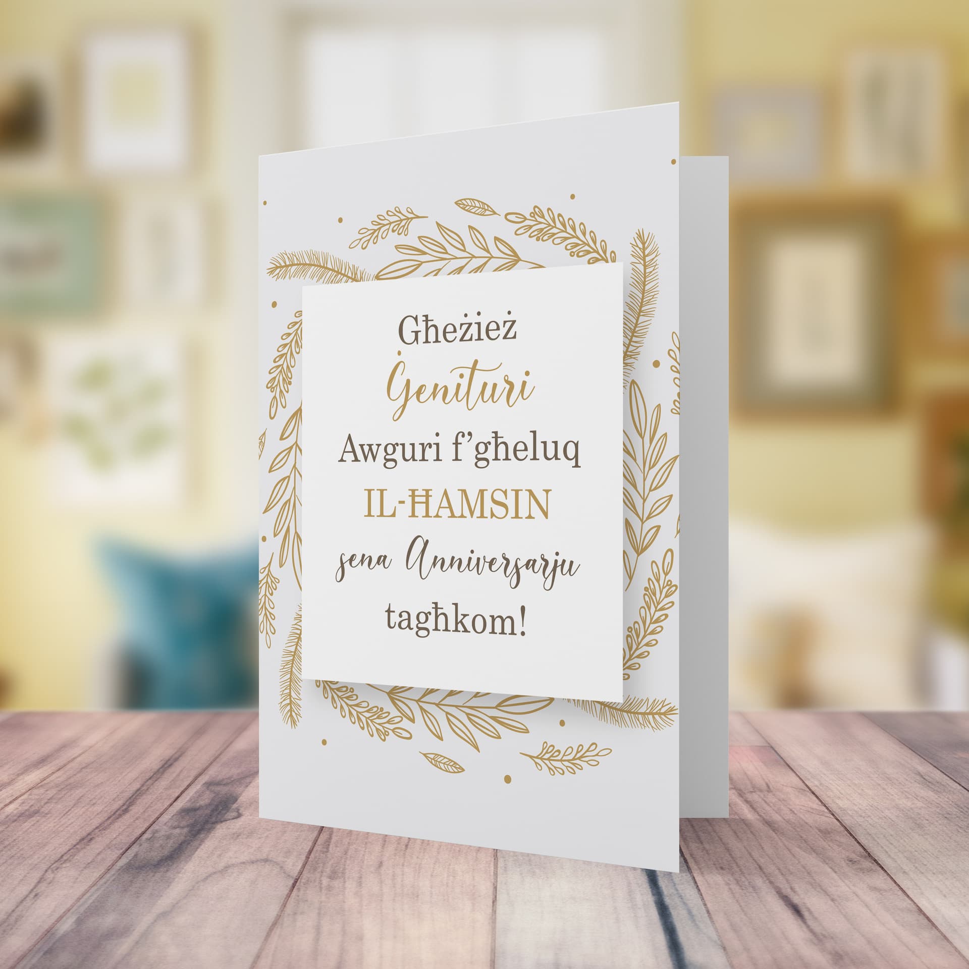 An A5 50th Wedding Anniversary card for parents with golden leaves border in Maltese