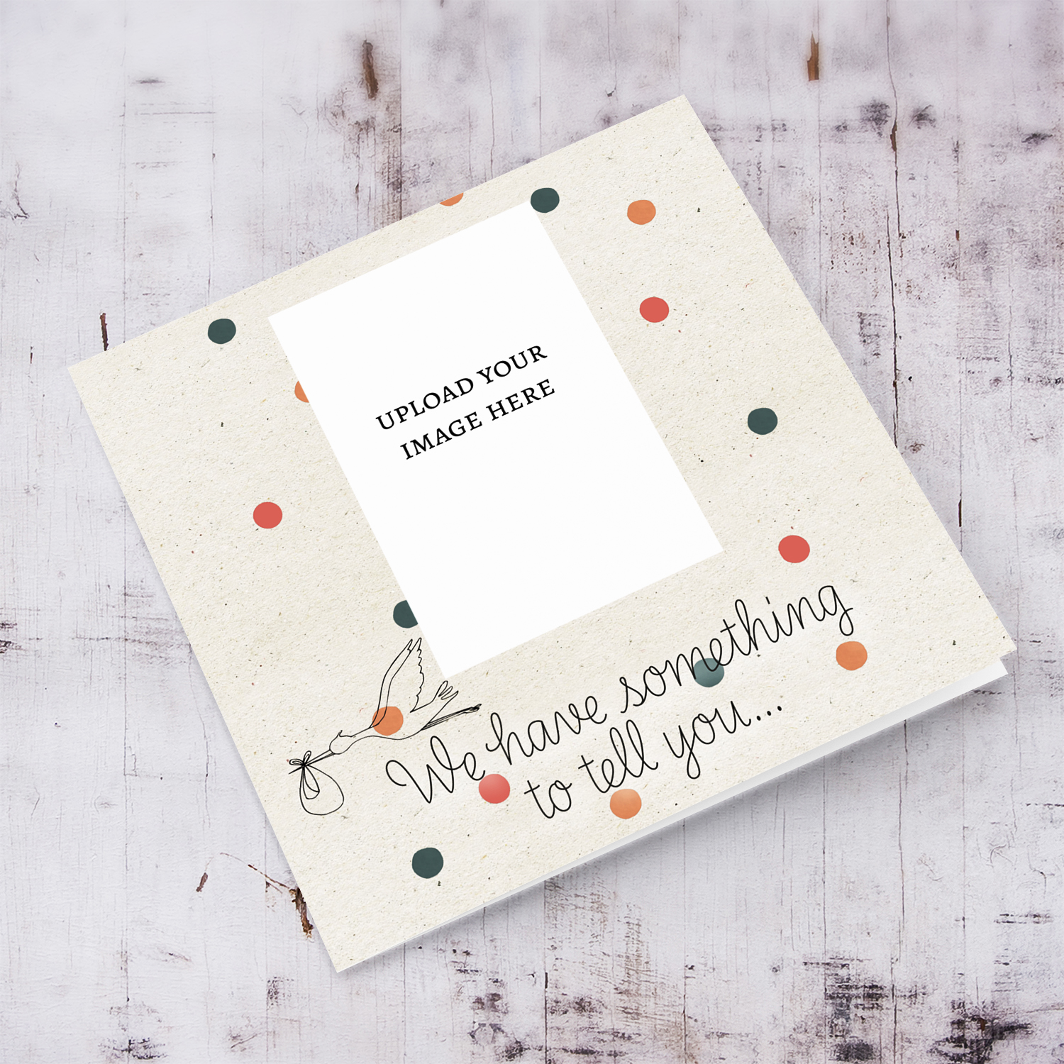 We have something to tell you - baby announcement photo card with spotty background and flying stork in English