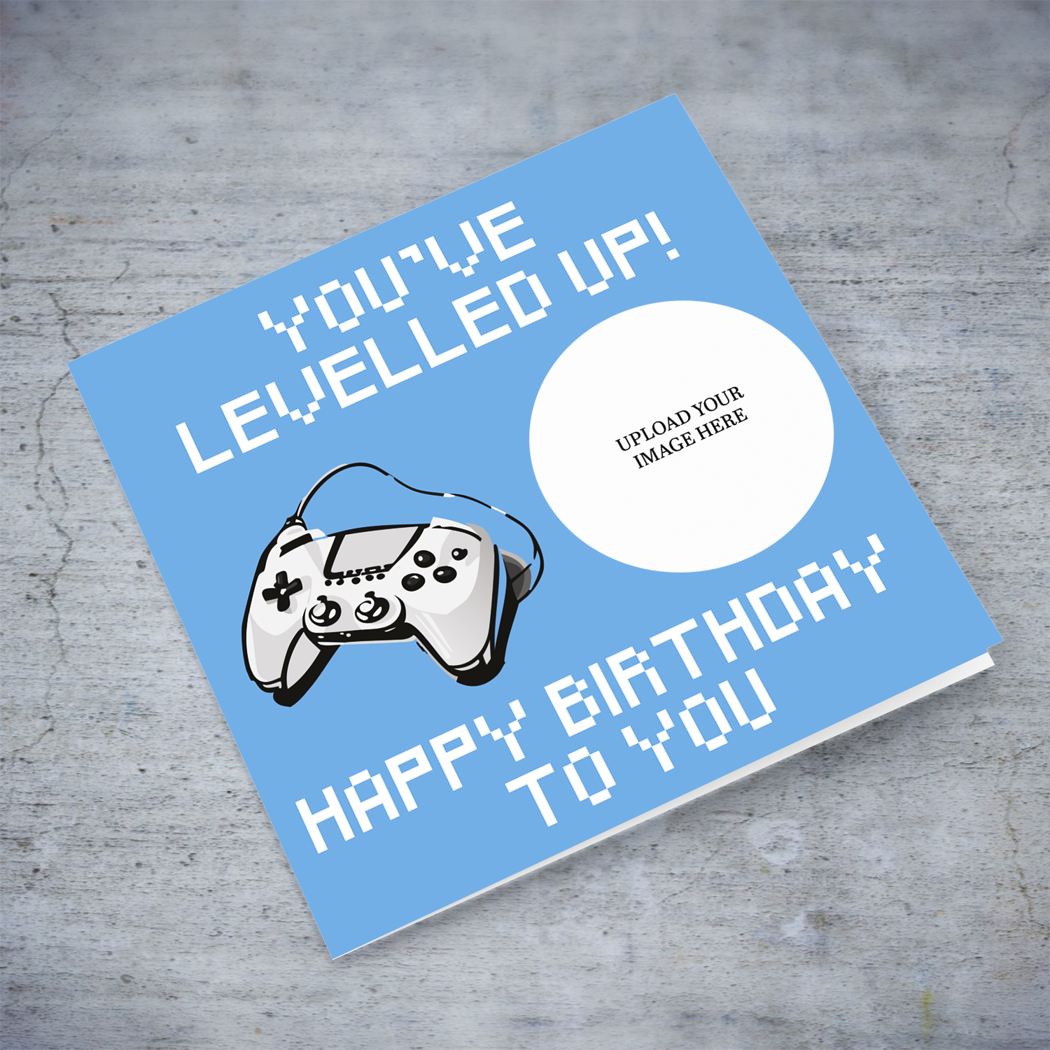 Photo birthday card in blue background and gaming console in English