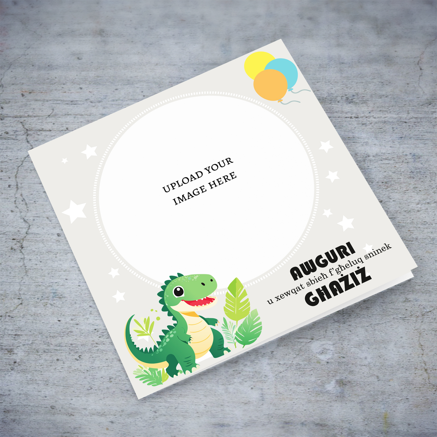 A cute photo card featuring a dinosaur, colourful balloons and scattered white stars in Maltese