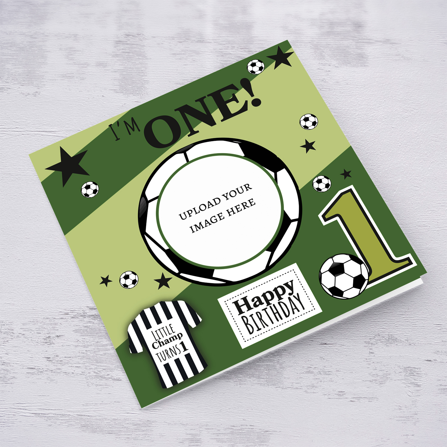A cute football themed photo birthday card for a 1 year old boy, featuring a green themed background, with scattered footballs in English 