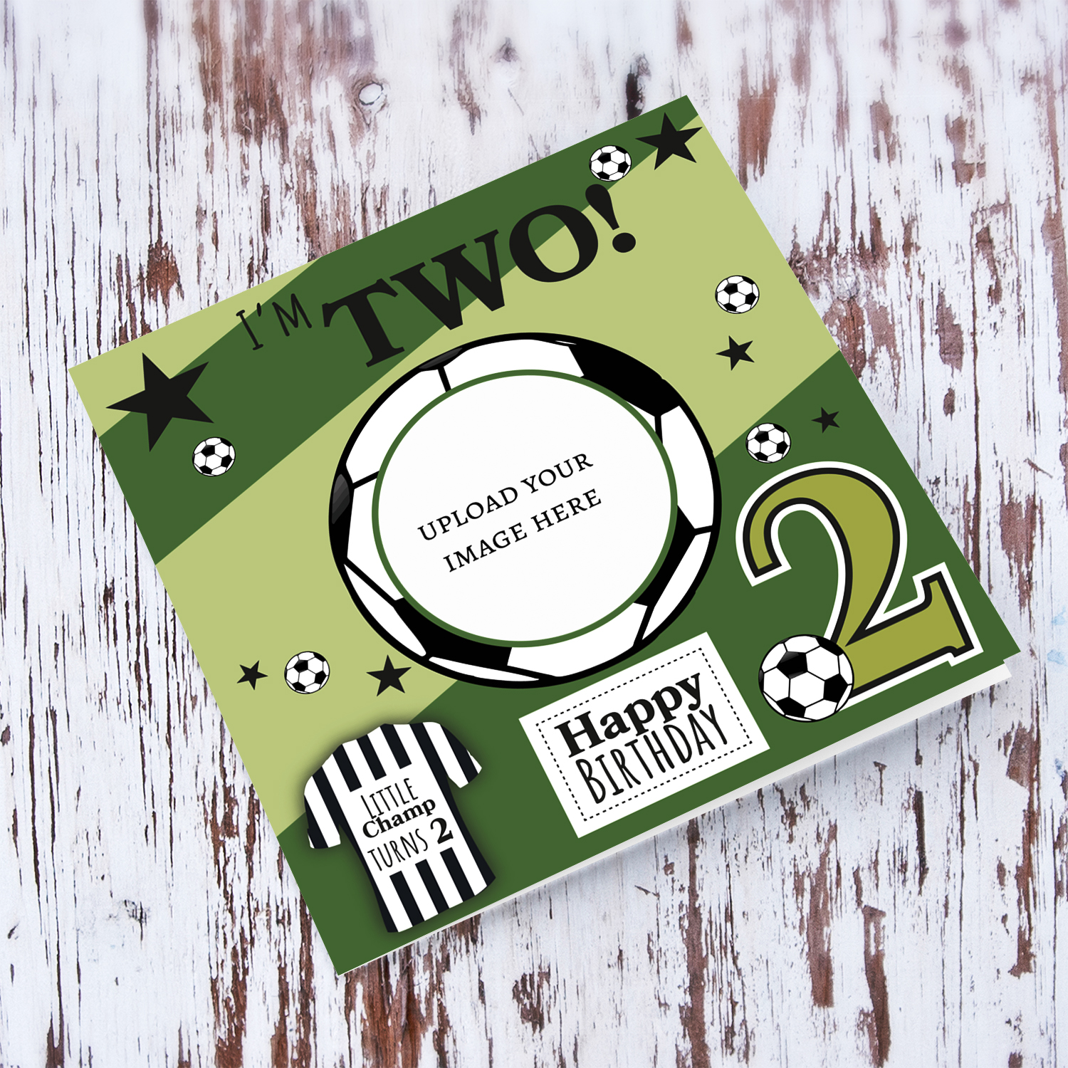 A cute football themed photo birthday card for a 2 year old boy, featuring a green themed background, with scattered footballs in English 