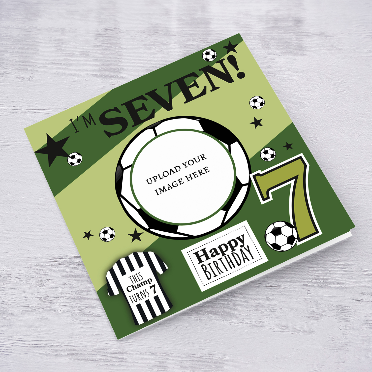 A cute football themed photo birthday card for a 7 year old boy, featuring a green themed background, with scattered footballs in English