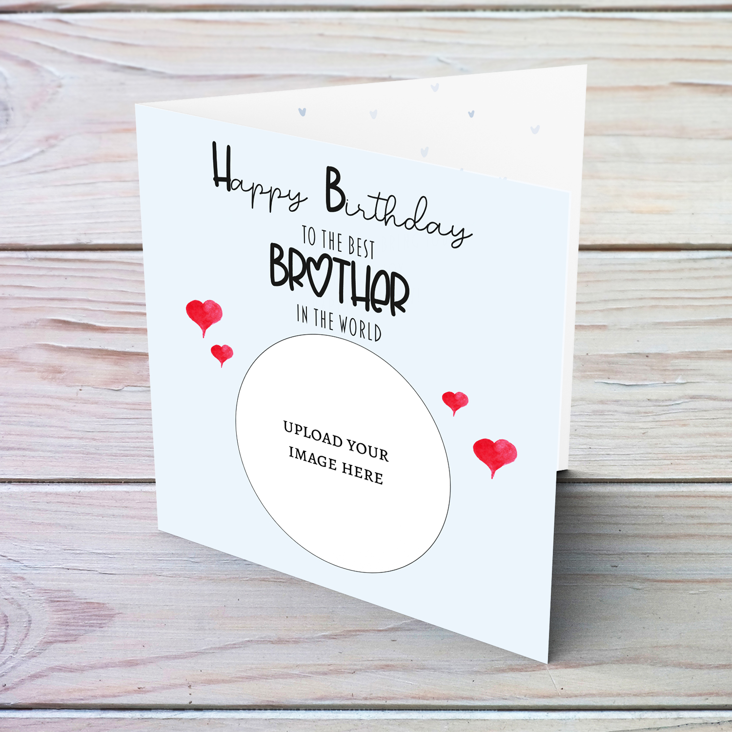A light blue coloured photo birthday card to the best brother in the world with small red hearts in English