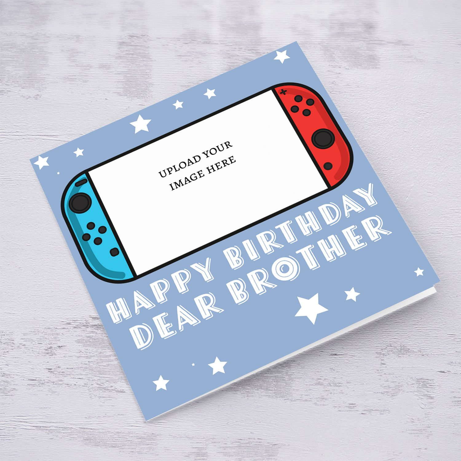 A photo birthday card for brother featuring a nintendo cartoon design, in a light blue background with scattered white stars in English