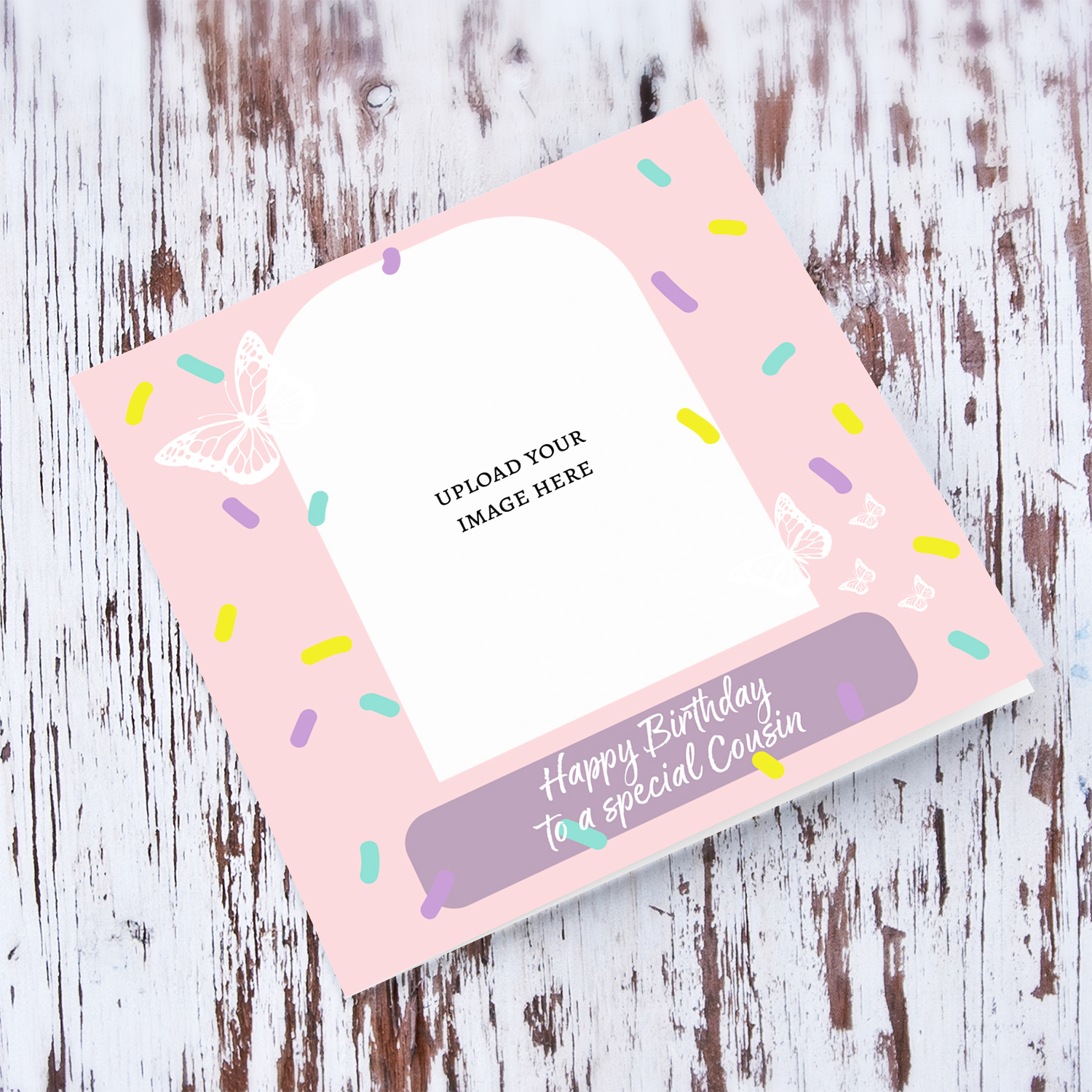A beautiful photo birthday card for cousin, in pink background, colourful confetti and scattered white butterflies in English