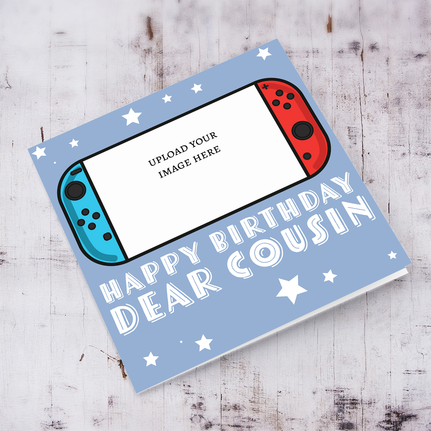 A photo birthday card for cousin featuring a nintendo cartoon design, in a light blue background with scattered white stars in English