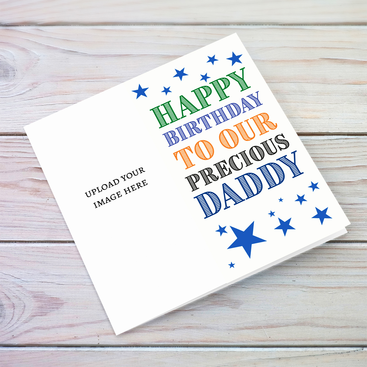 A portrait photo birthday card in colourful text for daddy with scattered blue stars in English 