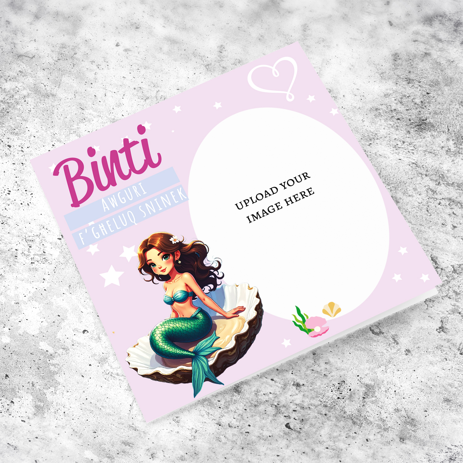 A cute photo birthday card for DAUGHTER in light pink background with a brunette mermaid, sitting in an oyster shell in Maltese