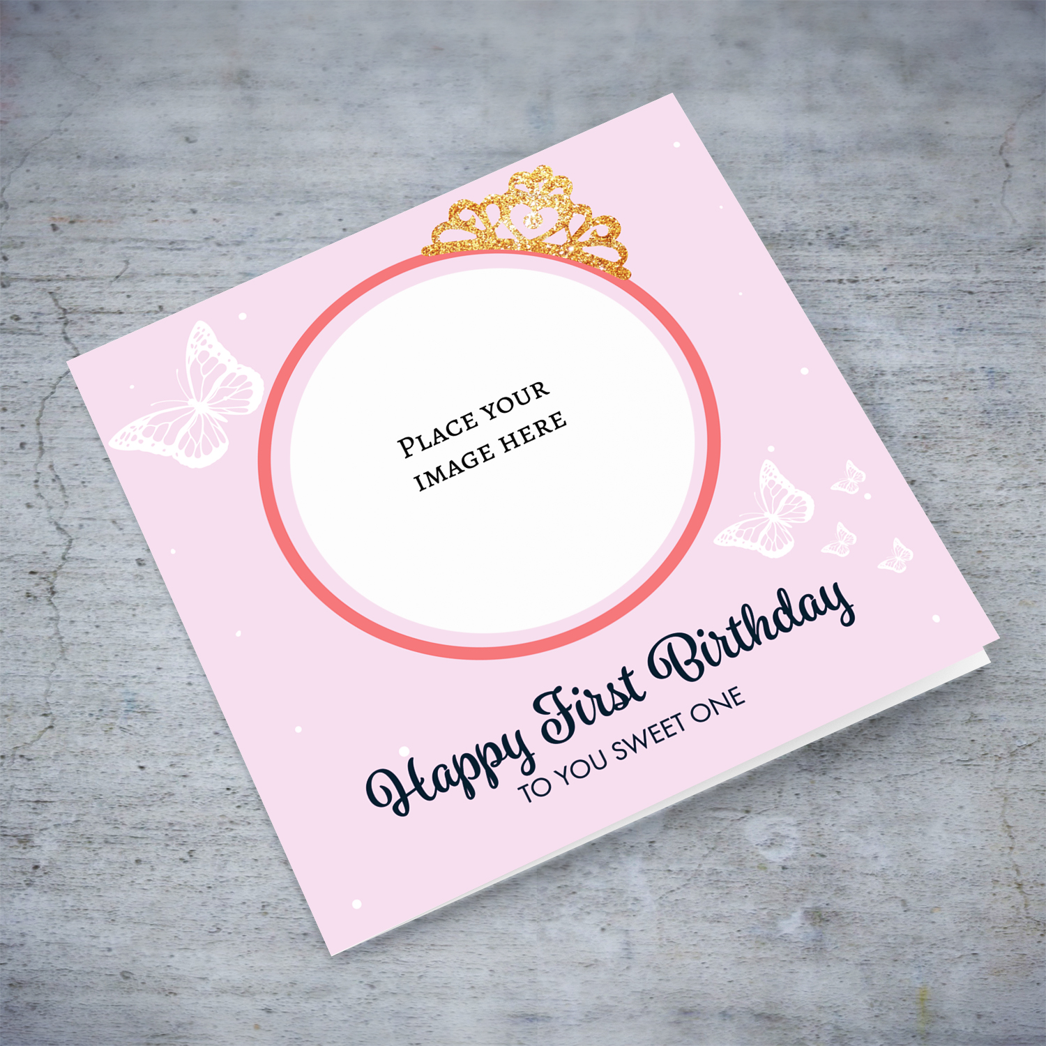 Pink coloured background first birthday card with butterflies and crown photo card in English