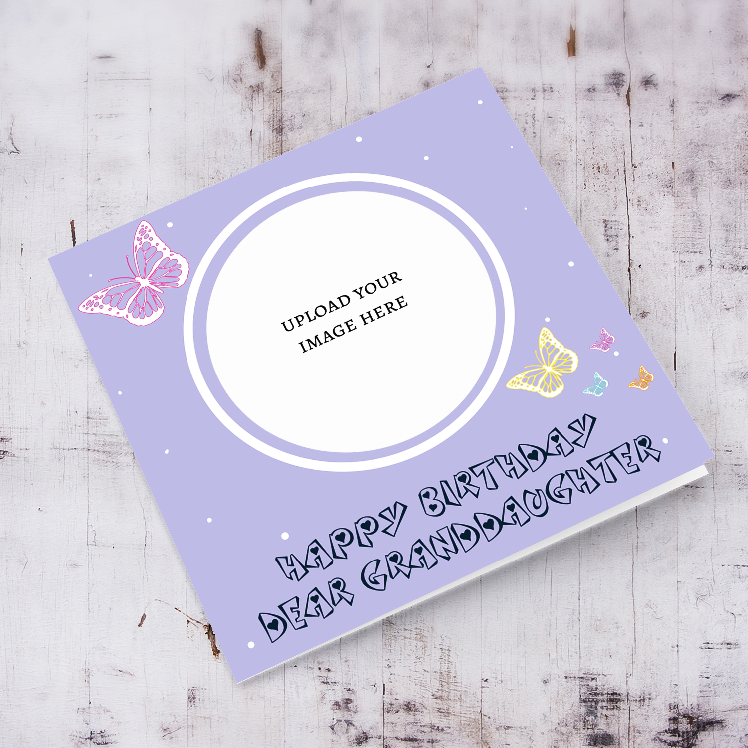 A cute photo birthday card for Granddaughter in a light purple background with colourful butterflies in English