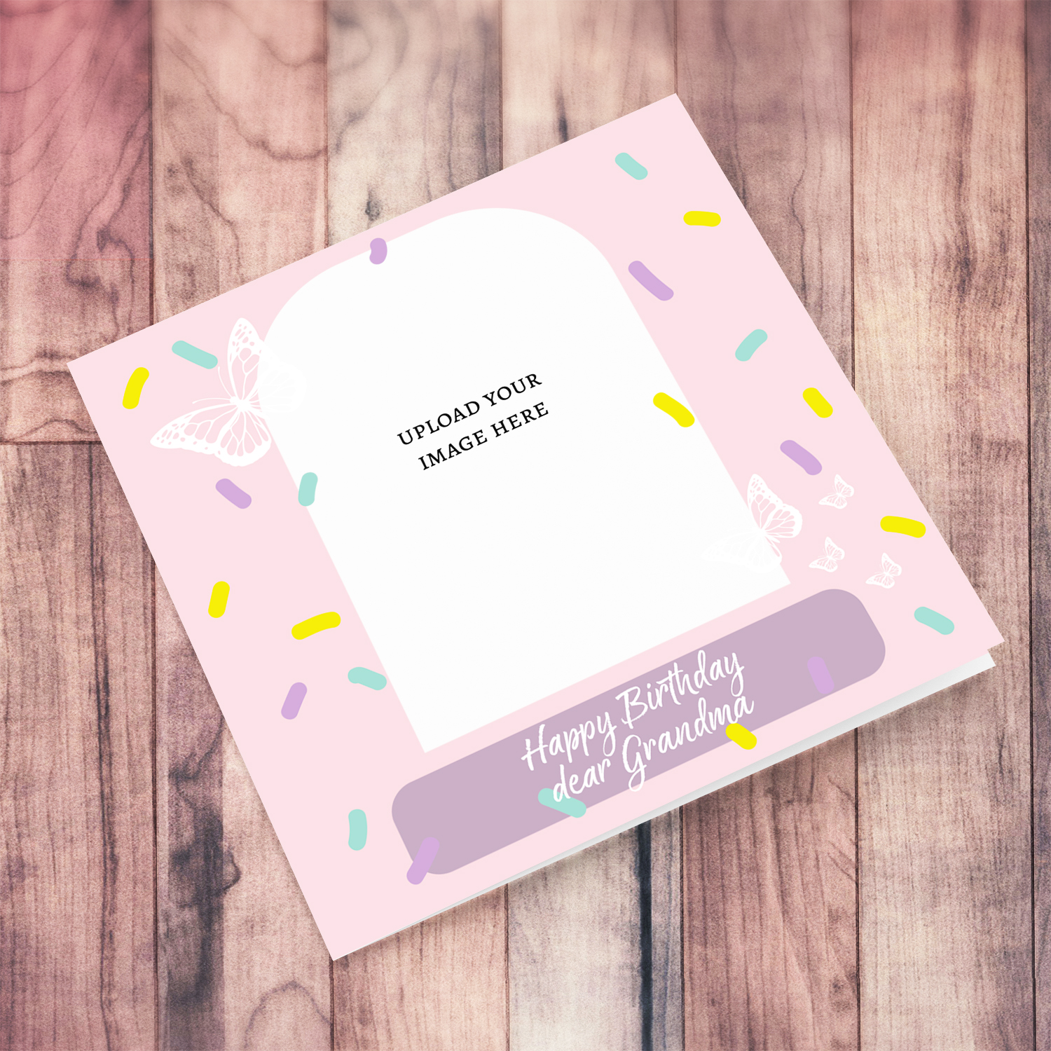 A beautiful photo birthday card for GRANDMA, in pink background, colourful confetti and scattered white butterflies in English