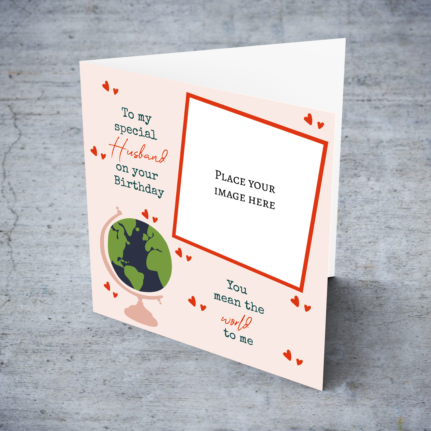 A romantic photo card for Husband - You mean the world to me - in light pink background, scattered hearts and a globe in English