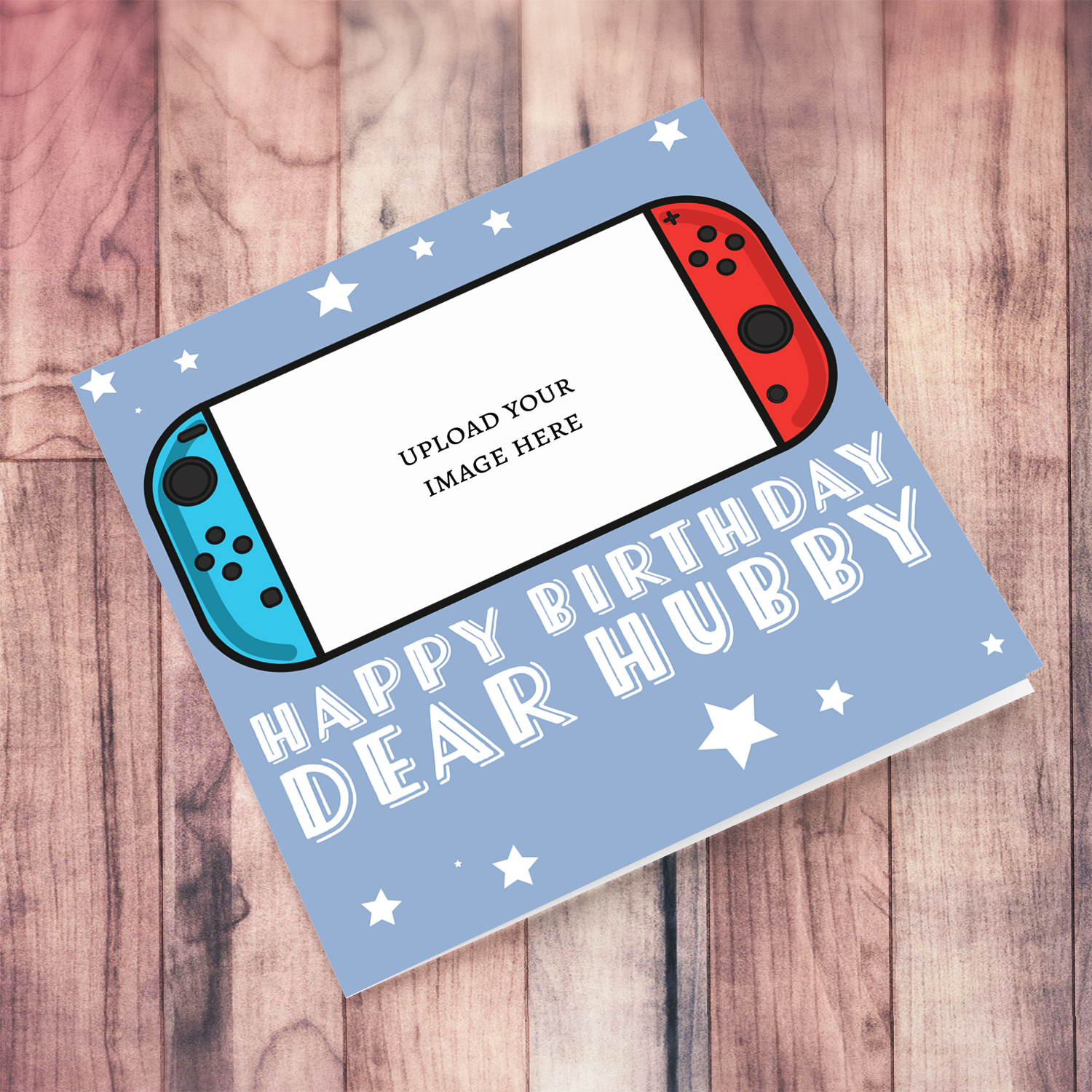 A photo birthday card for husband / hubby featuring a nintendo cartoon design, in a light blue background with scattered white stars in English