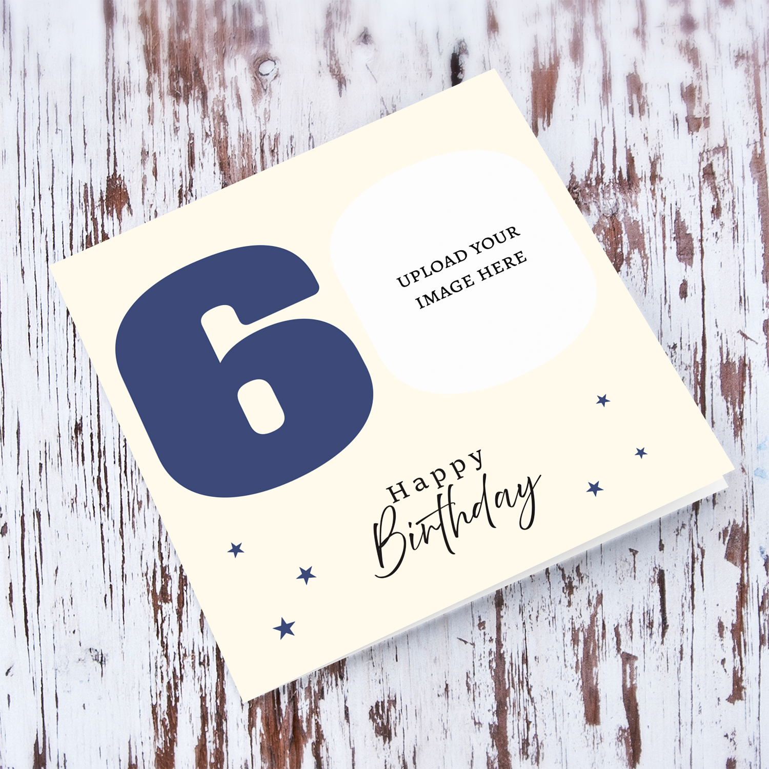 A 60th photo minimalist Birthday card in a cream background and dark blue stars in English 