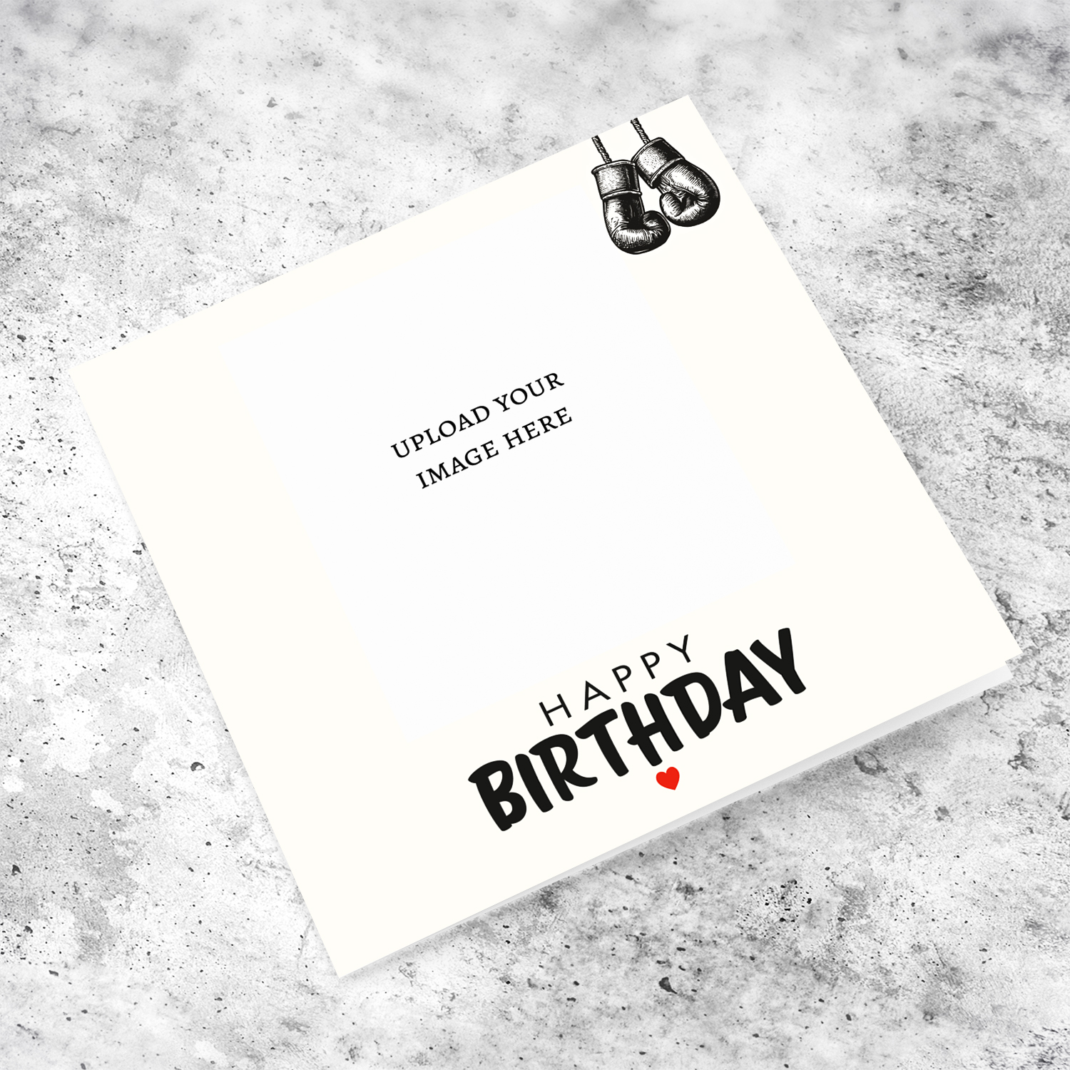 A minimalist birthday card in a light cream background featuring boxing gloves in English