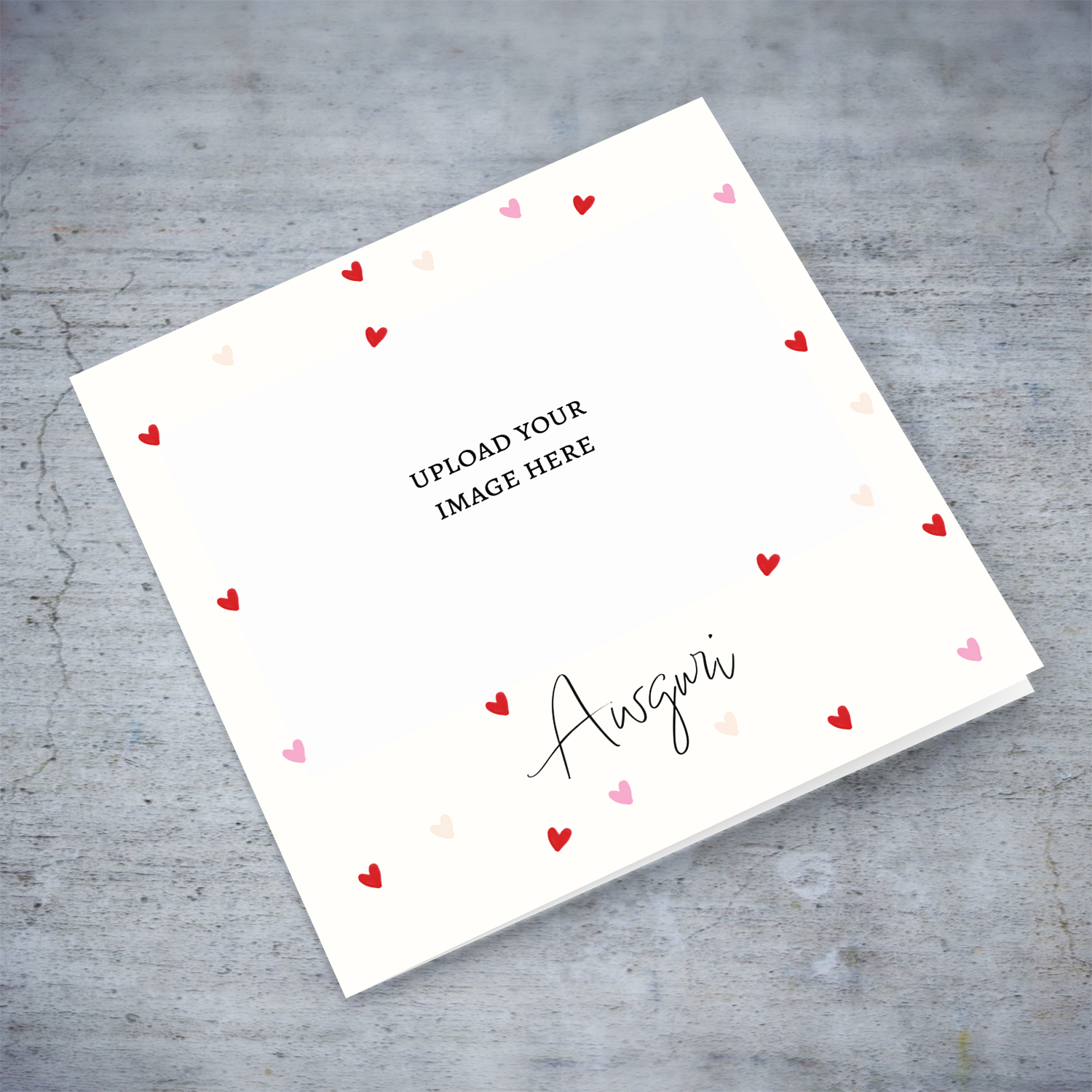 A cream coloured open photo card with scattered red and pink hearts in Maltese (Blank Message)