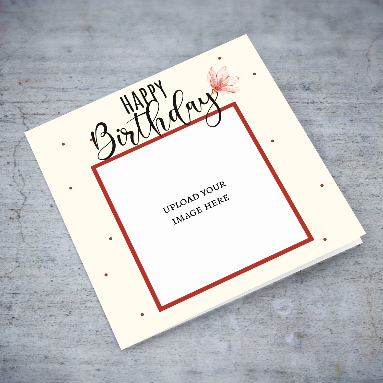 An open photo birthday card in a light cream background featuring a dainty pink flower in English