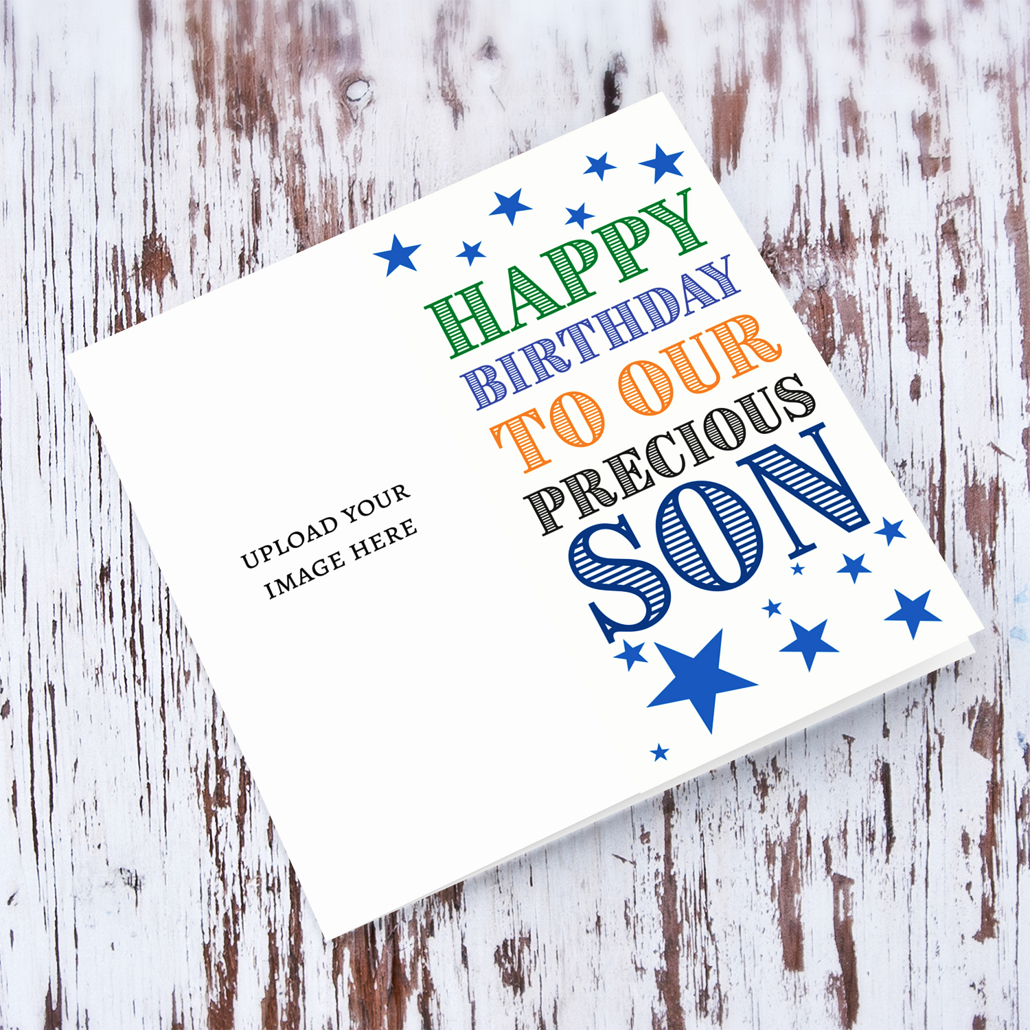 A portrait photo birthday card in colourful text for son with scattered blue stars in English 
