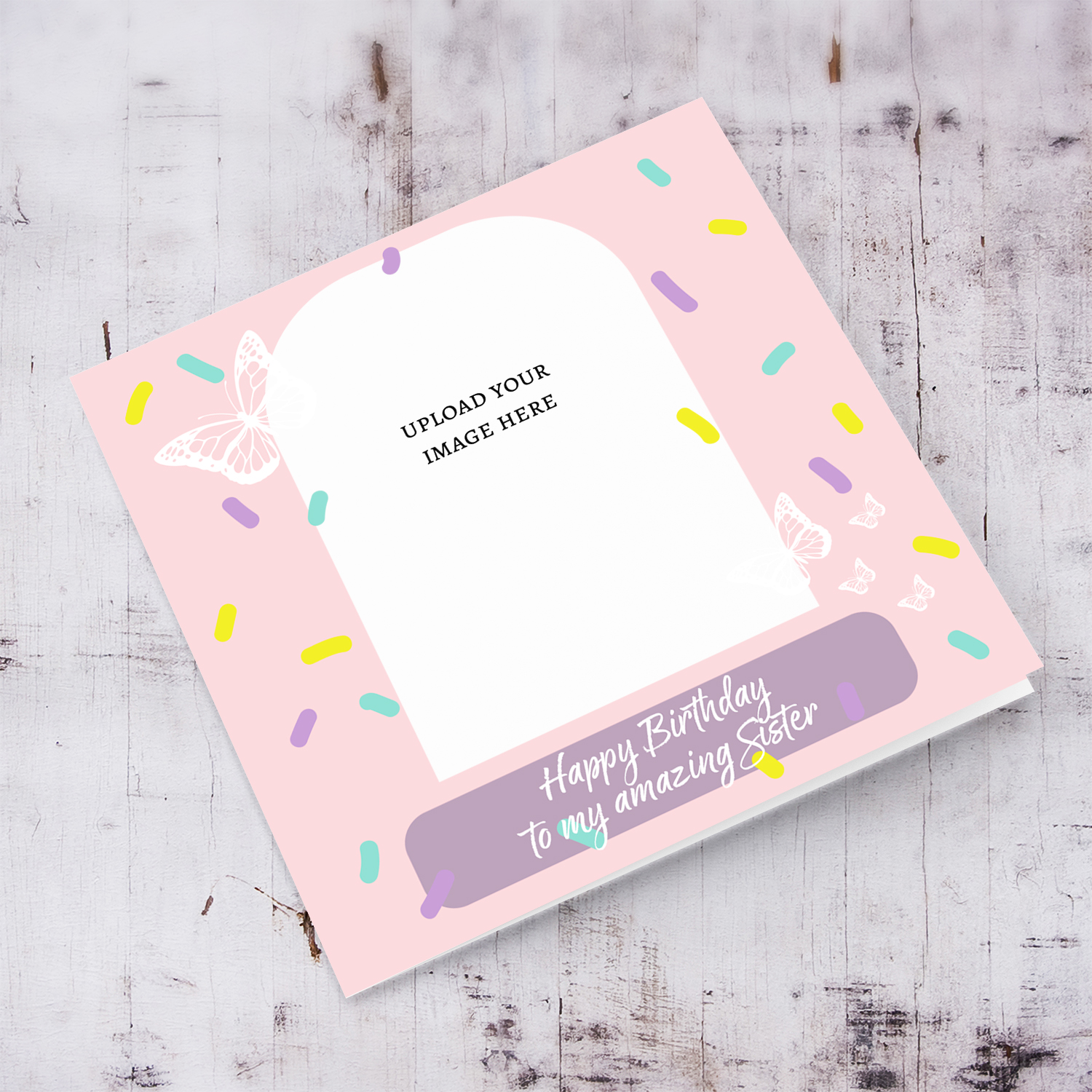 A beautiful photo birthday card for Sister, in pink background, colourful confetti and scattered white butterflies in English
