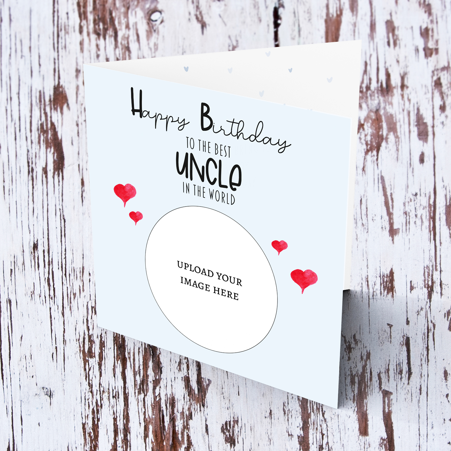 A light blue coloured photo birthday card to the best uncle in the world with small red hearts in English