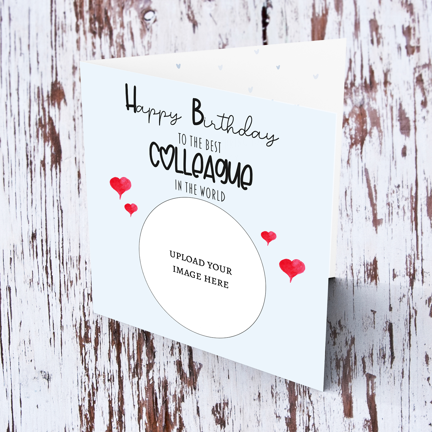 A light blue coloured photo birthday card to the best colleague in the world with small red hearts in English