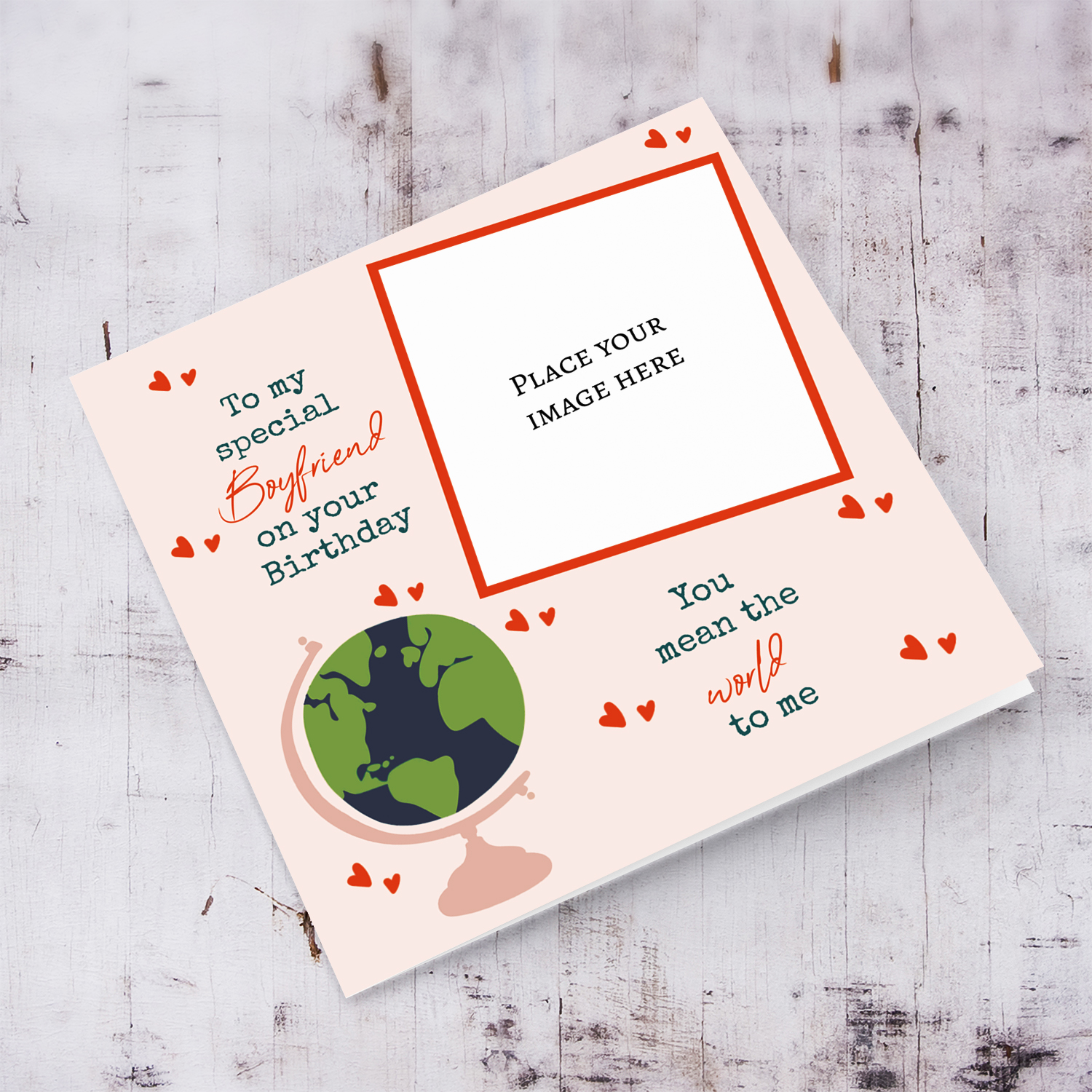 A romantic photo card for Boyfriend - You mean the world to me - in light pink background, scattered hearts and a globe in English