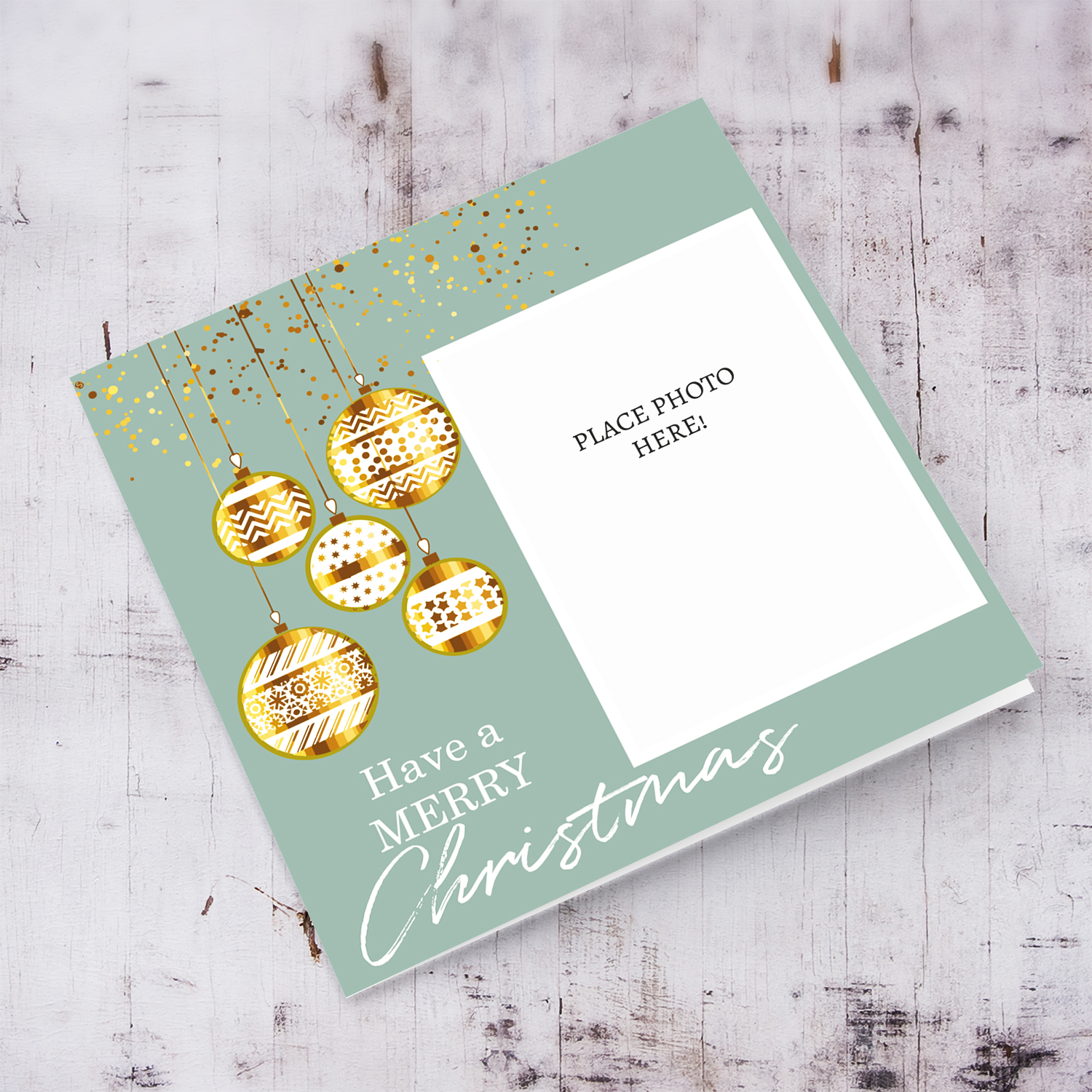 Open photo Christmas card in Pastel background, hanging baubles with white text in English
