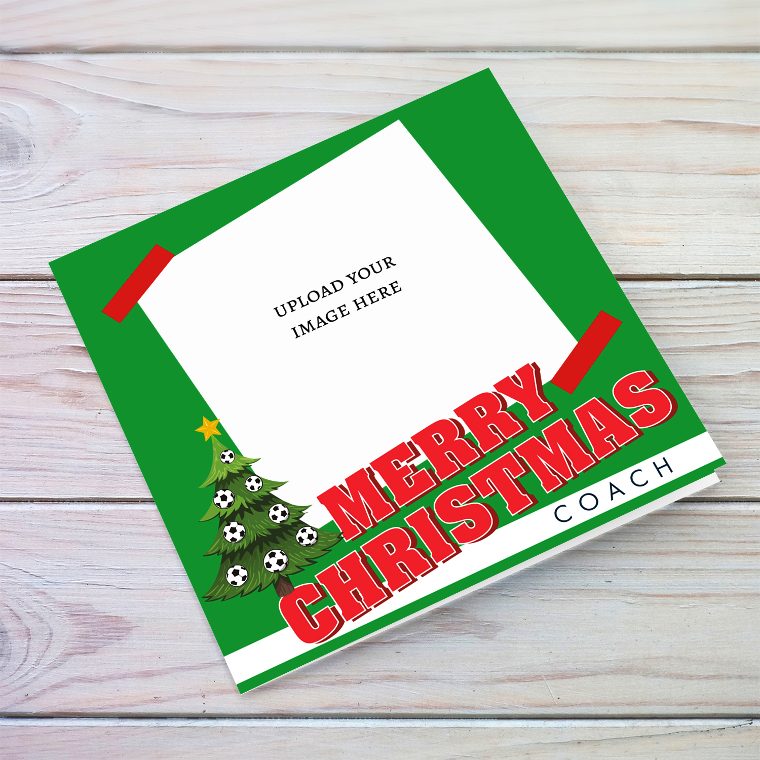 Merry Christmas photo card for coach in traditional green and red christmas colours with Christmas tree and hanging footballs in English
