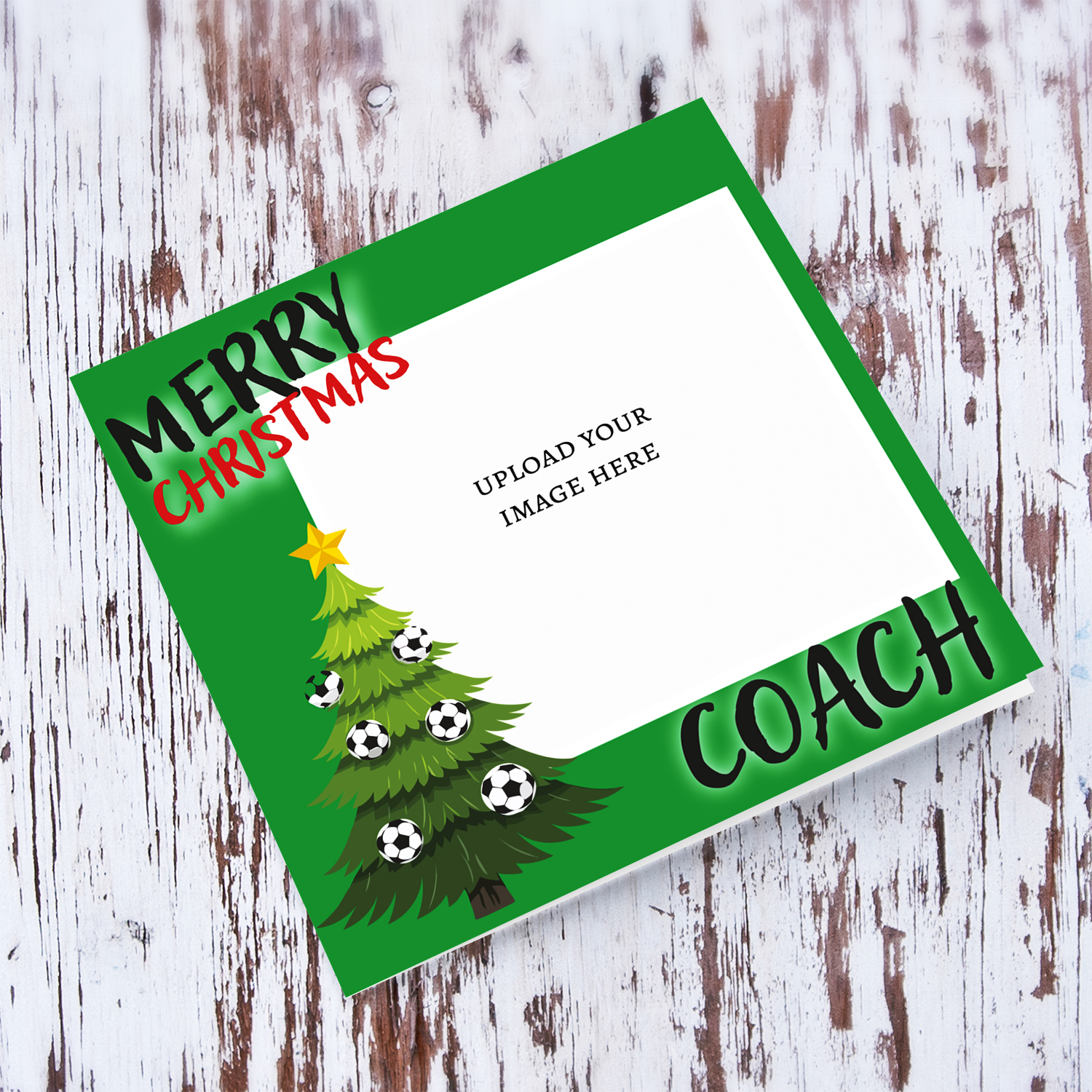 Merry Christmas photo card for coach in traditional green christmas colours with Christmas tree and hanging footballs in English
