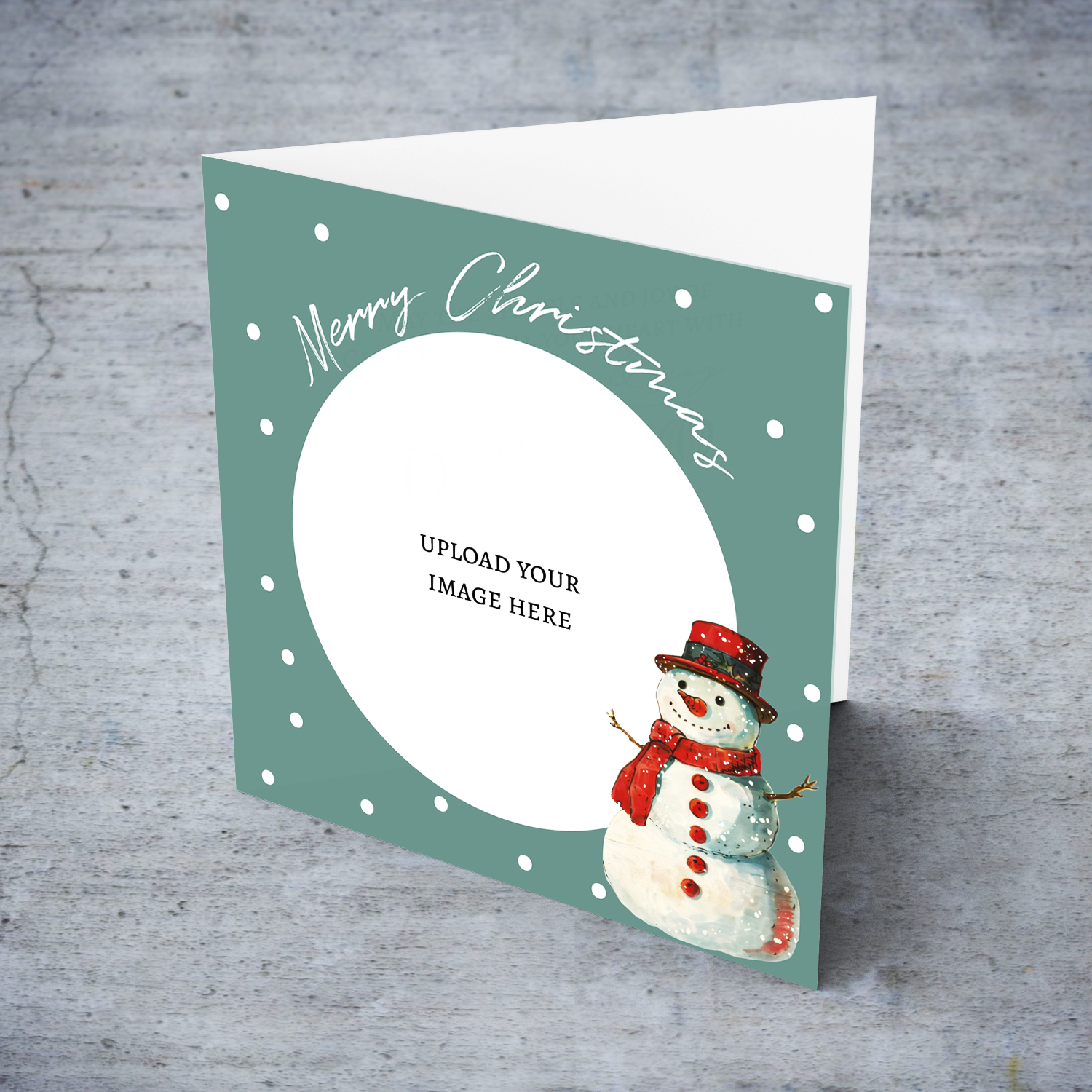An open photo Christmas card in gray/green background, featuring a happy snowman in English