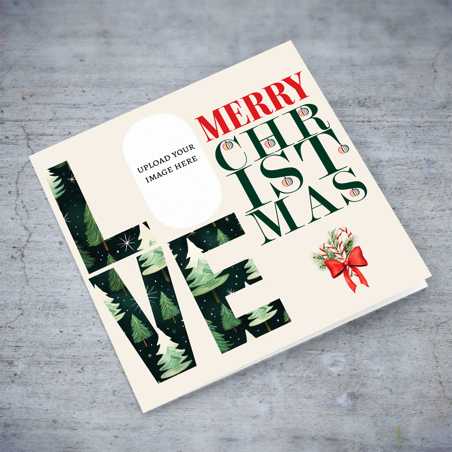 An open modern photo Christmas card in red and green text, featuring LOVE with a Christmassy background in English