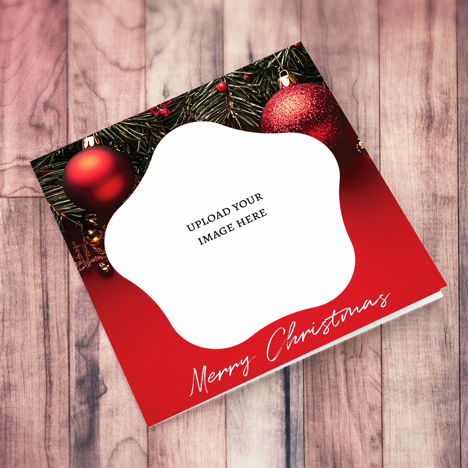 A photo Christmas card with christmas tree braches and red baubles in English