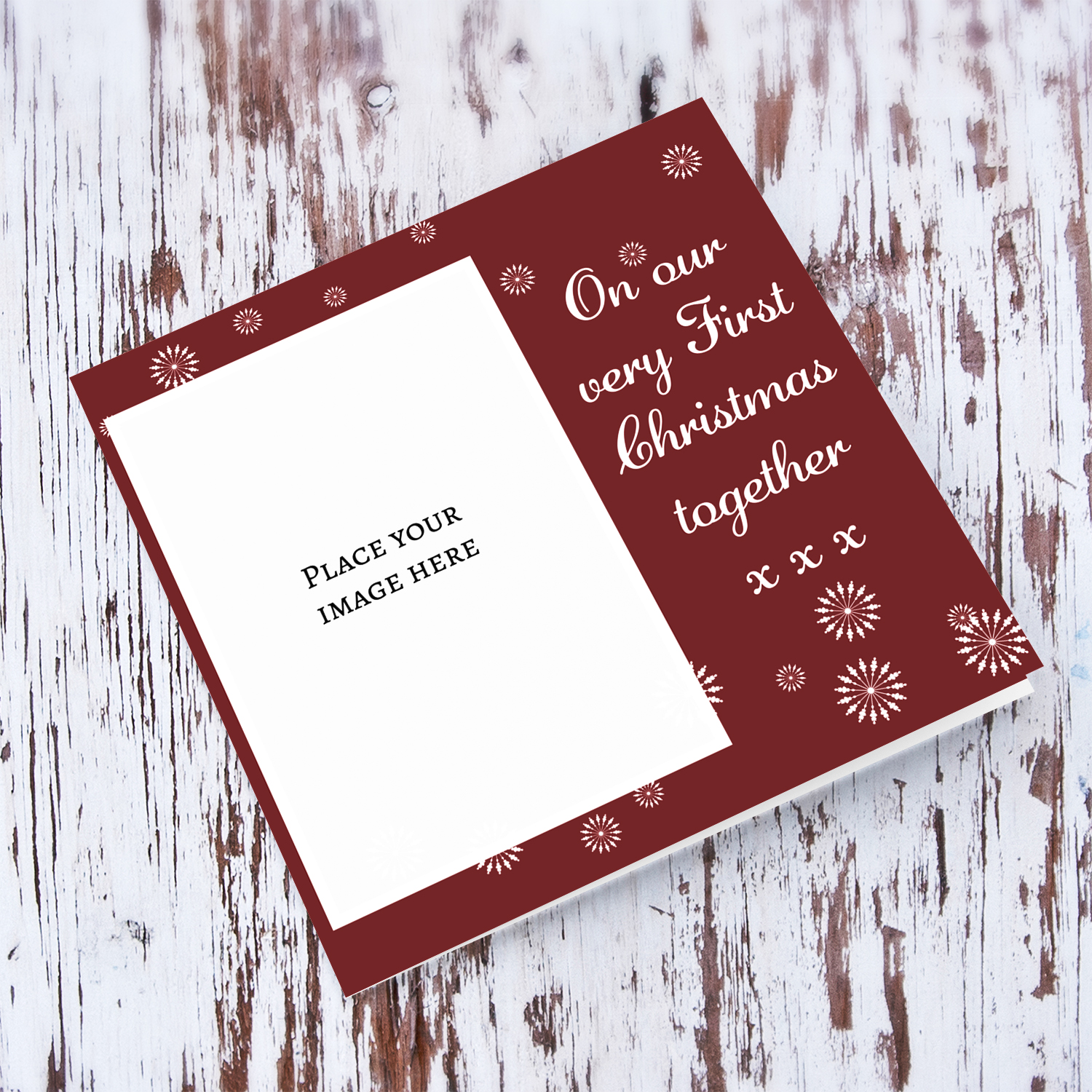 First Christmas together photo card in red background with scattered snowflakes in English