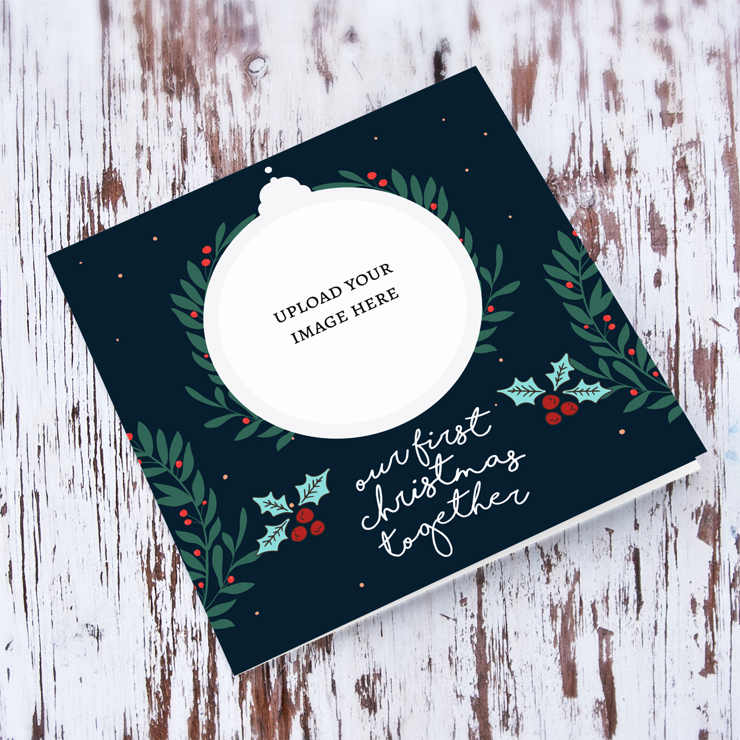 First Christmas together photo card in dark blue background and christmas hollies in English