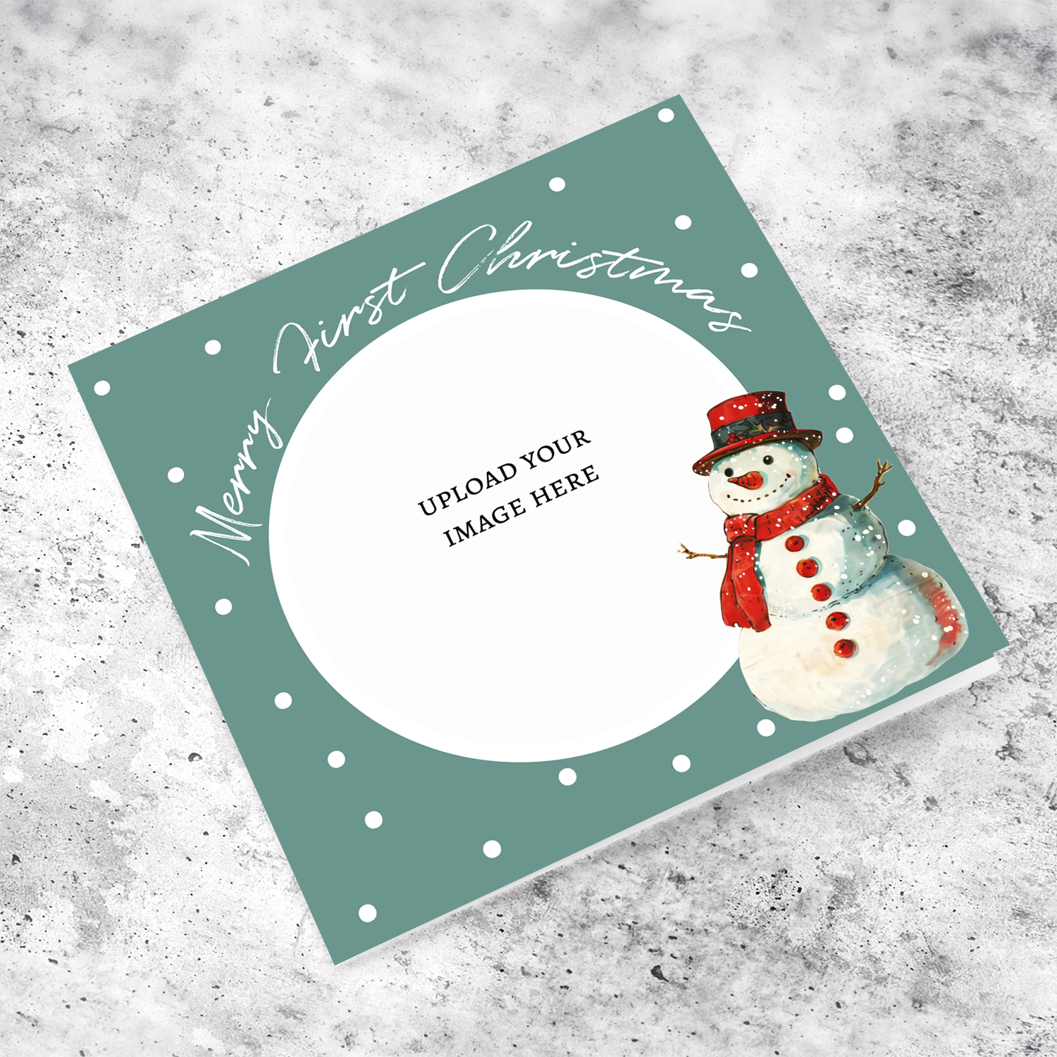 A photo Christmas card in gray/green background, featuring a happy snowman for First Christmas in English