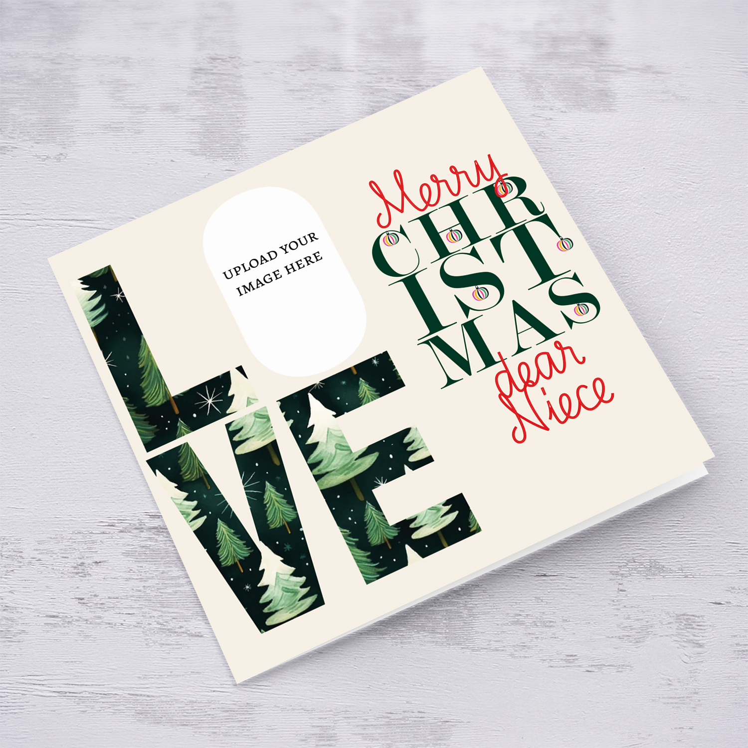 A modern photo Christmas card for Niece in red and green text, featuring LOVE with a Christmassy background in English