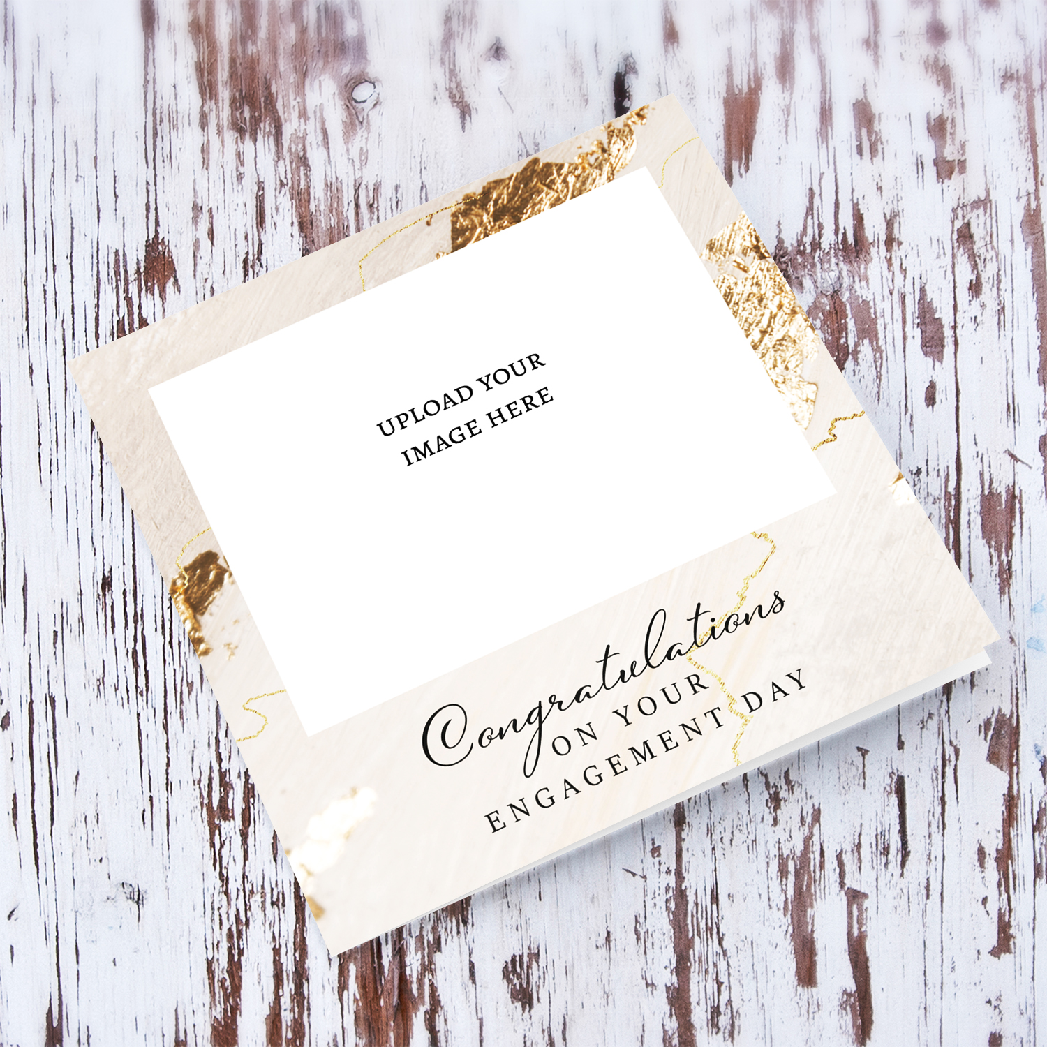 An elegant photo engagement card with a marble and gold design in English