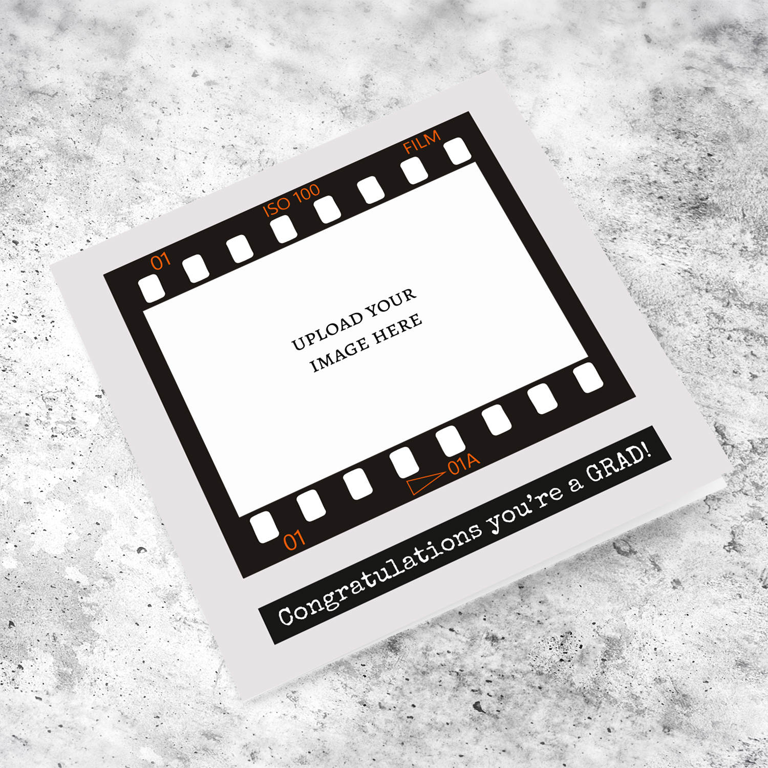 A photo graduation card featuring a black photo film reel to upload photo into and a neutral background in English