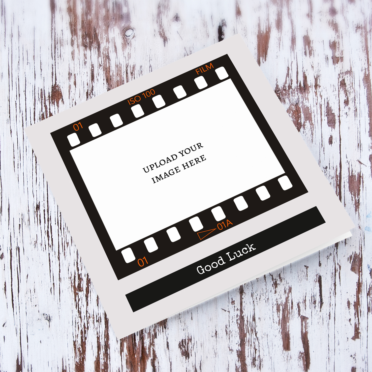 A photo good luck card featuring a black photo film reel to upload photo into and a neutral background in English
